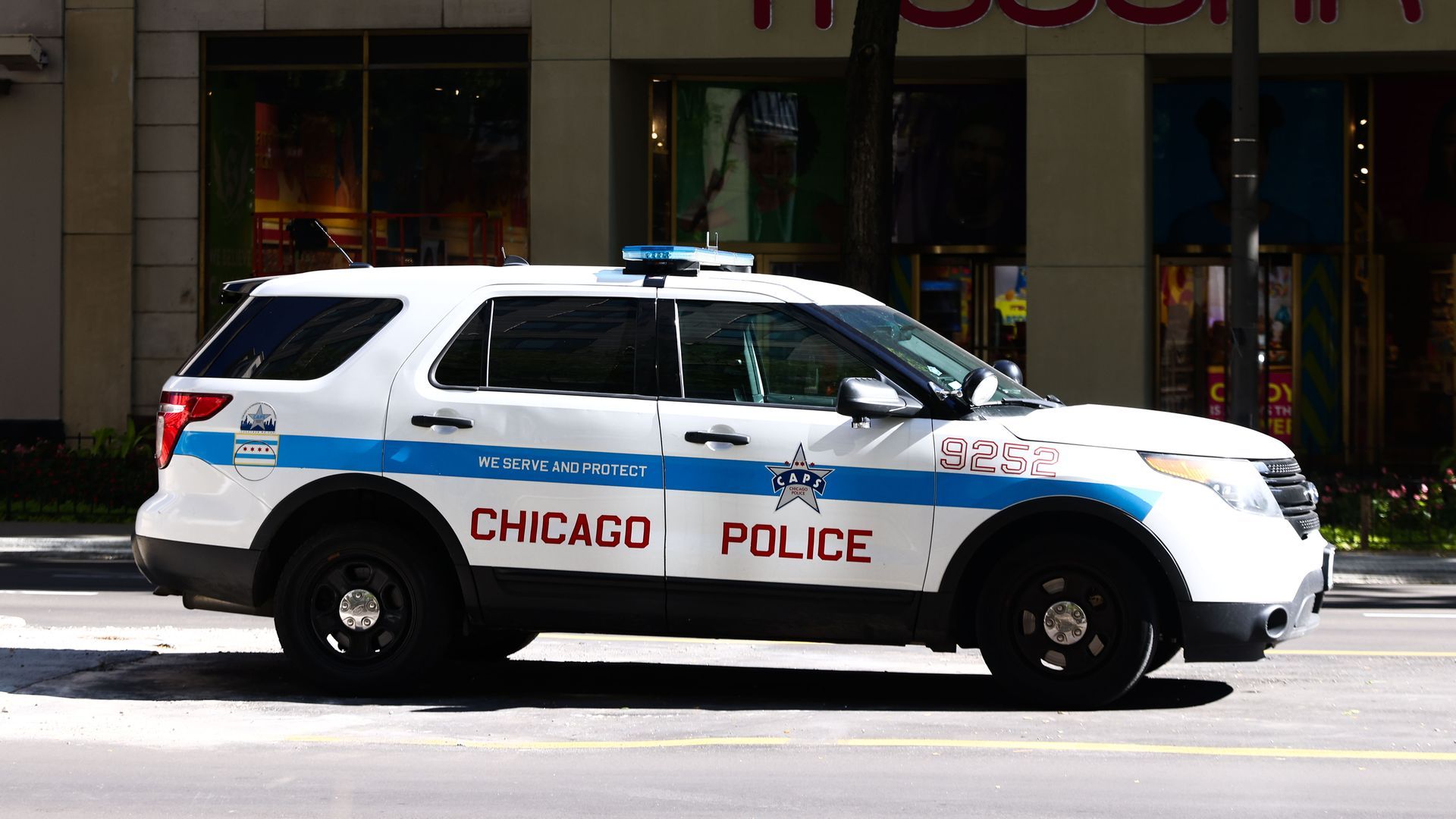 The side of a Chicago police SUV in downtown Chicago.