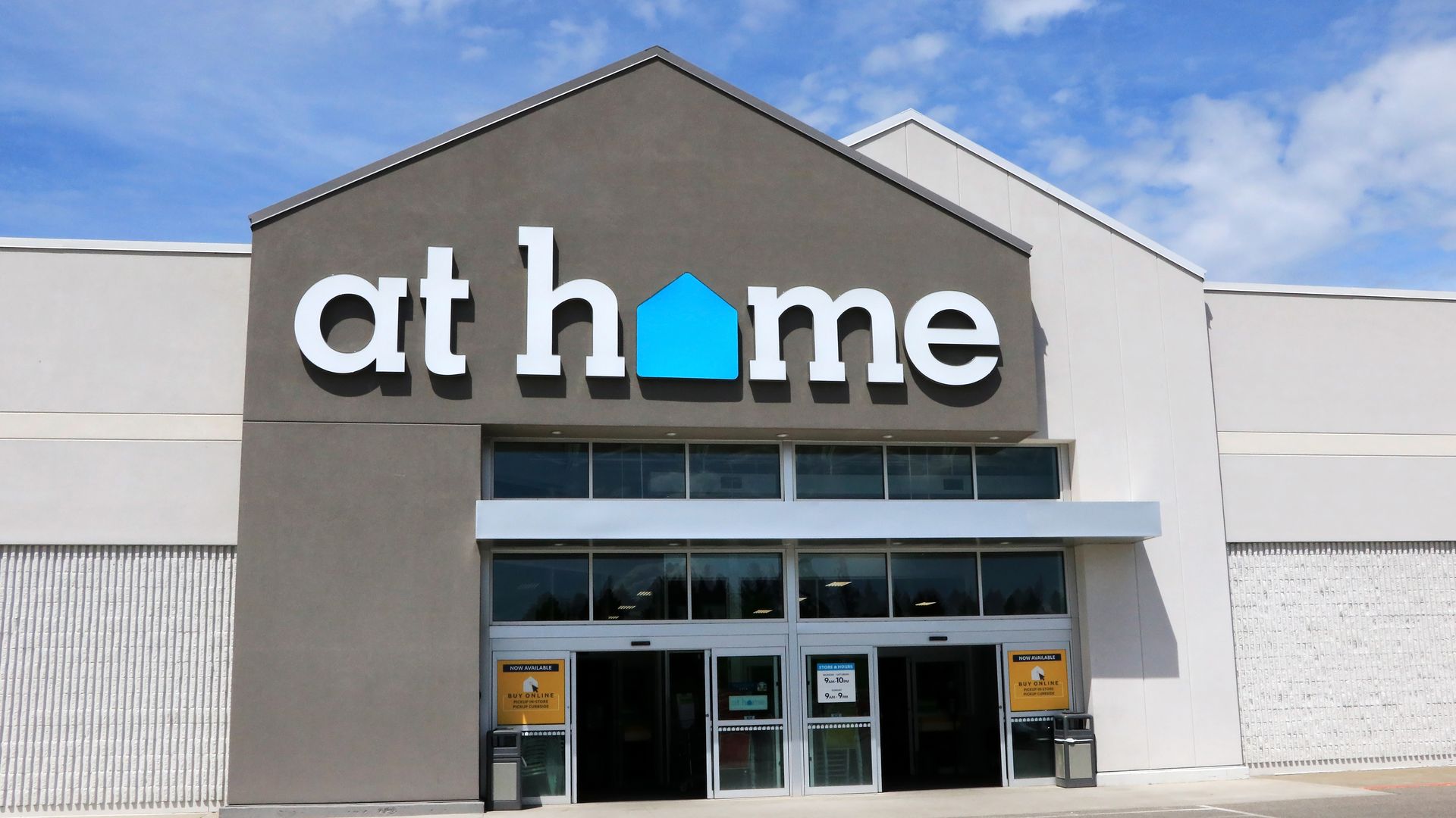 A photo of the outside of an "at home" home decor store 