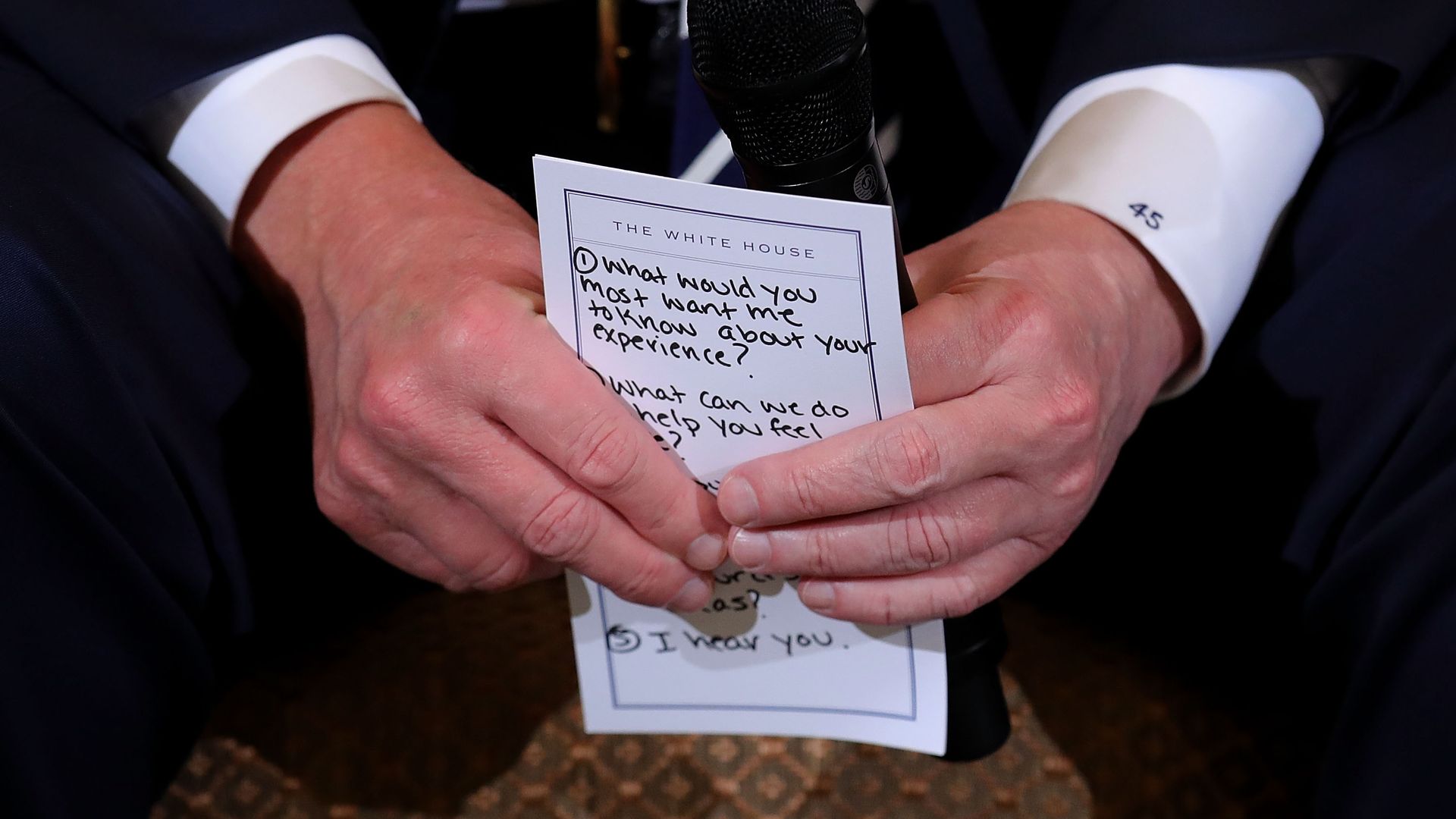 President Trump holds his notes