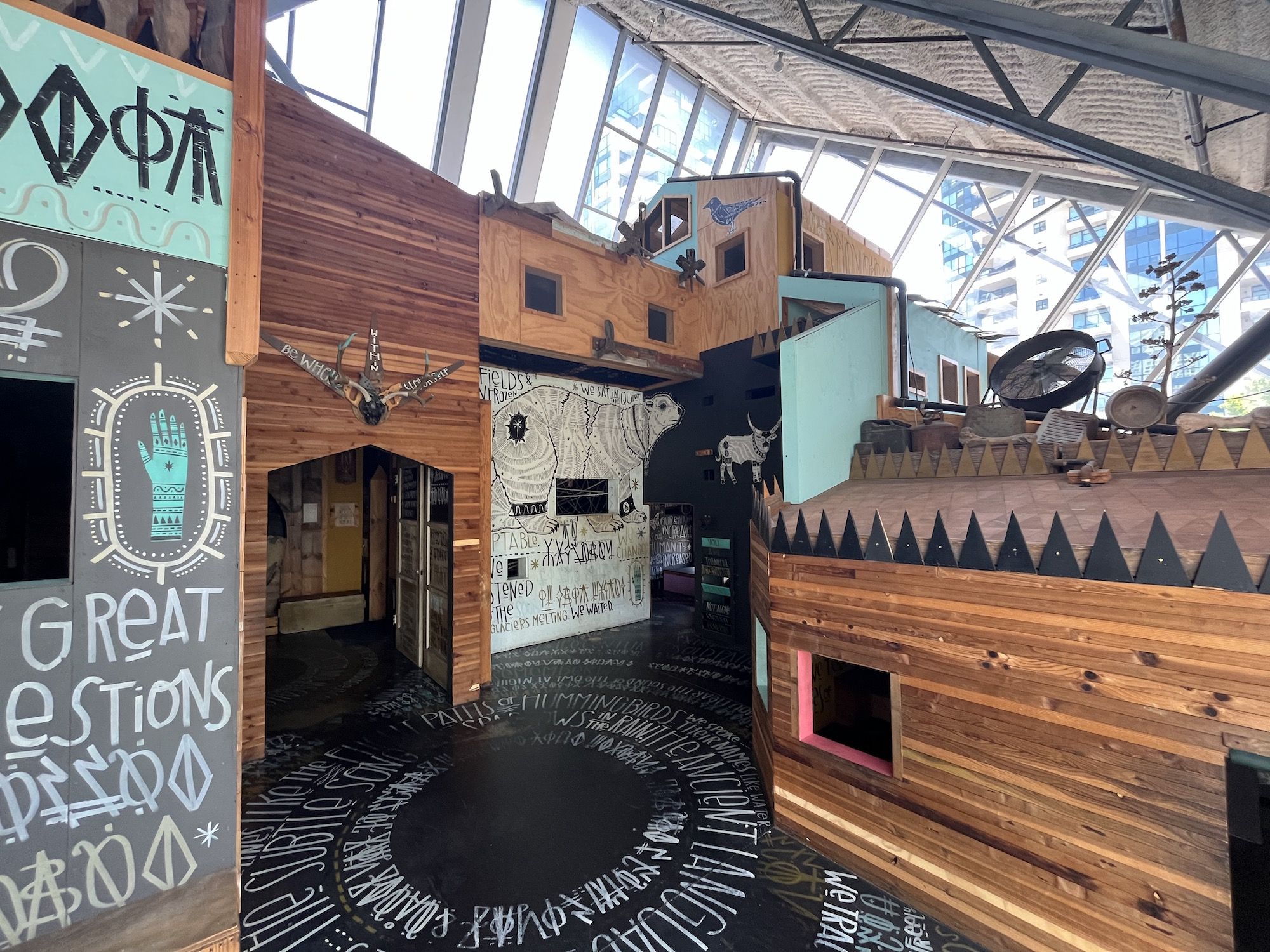 A treehouse-like structure in an art museum.