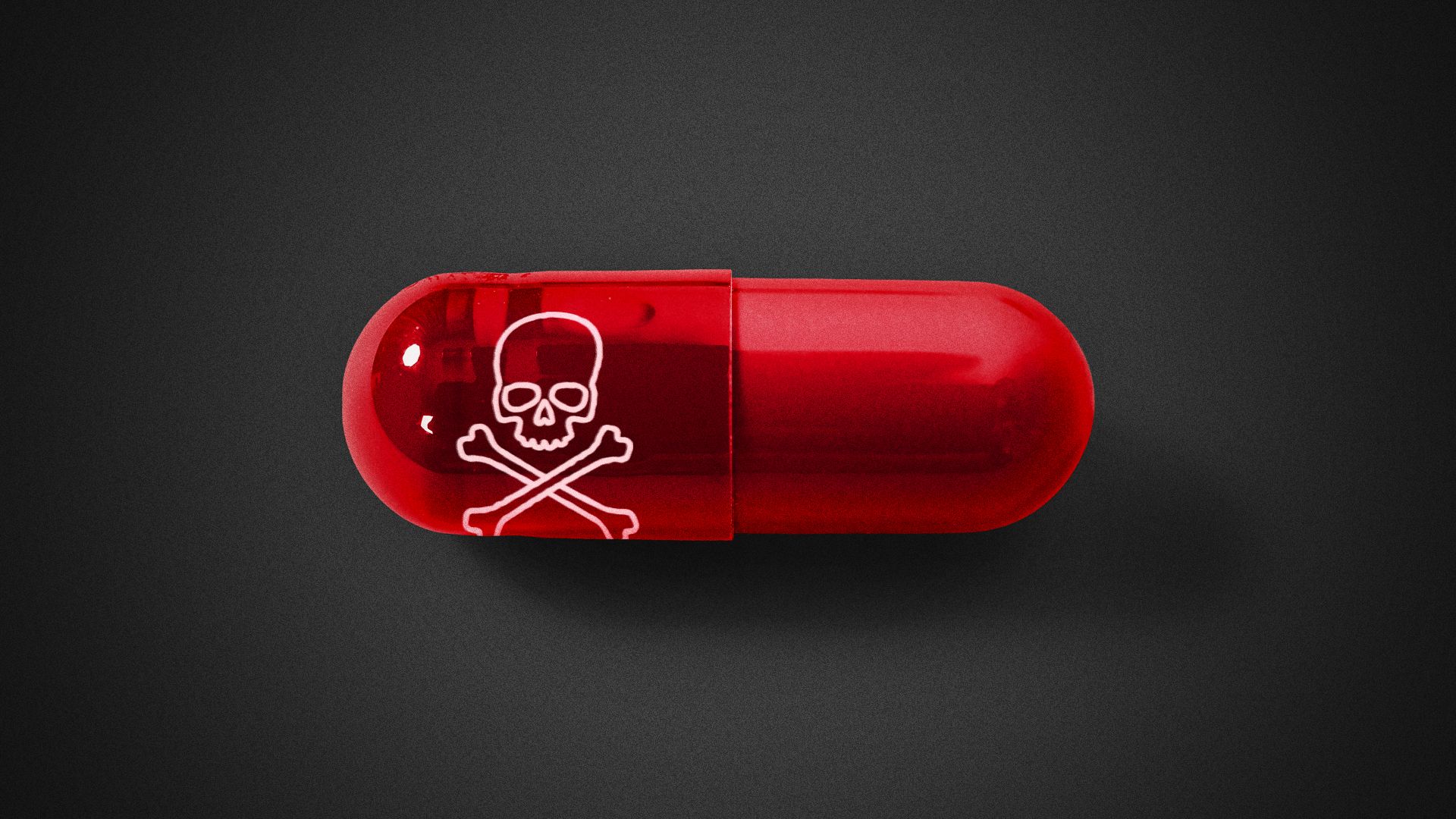 Illustration of a poisonous red pill with a skull and crossbones on it. 