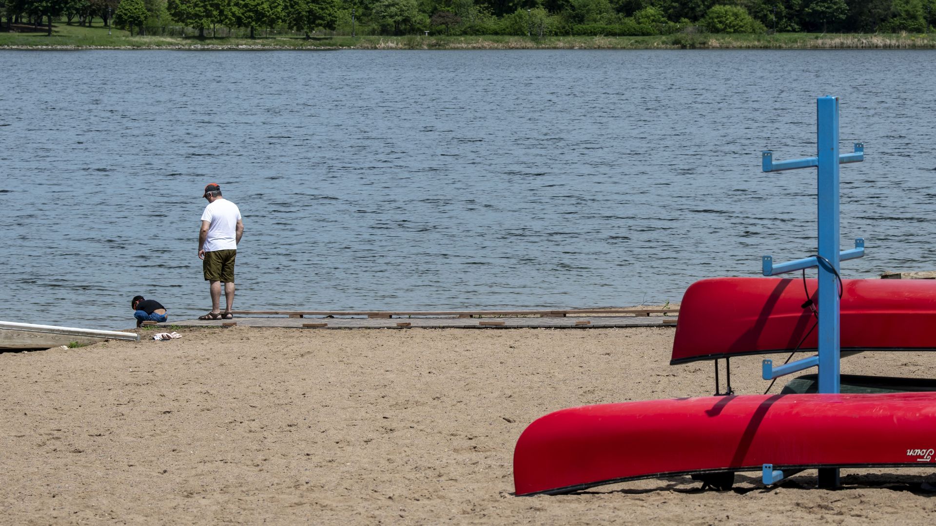 man looks out at lake phalen in minnesota