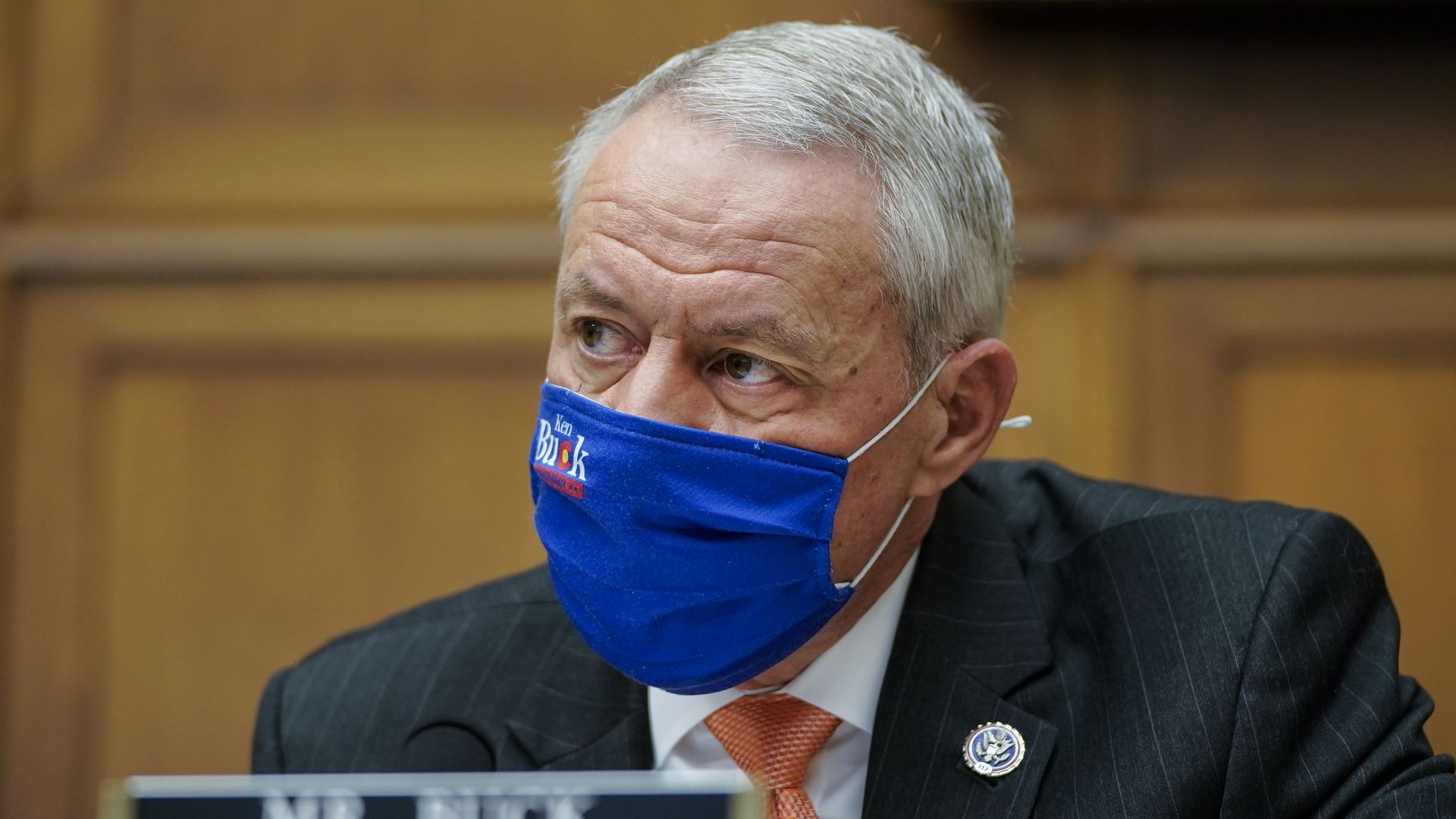Photo of Rep. Ken Buck (R-Colo.) wearing a blue mask.