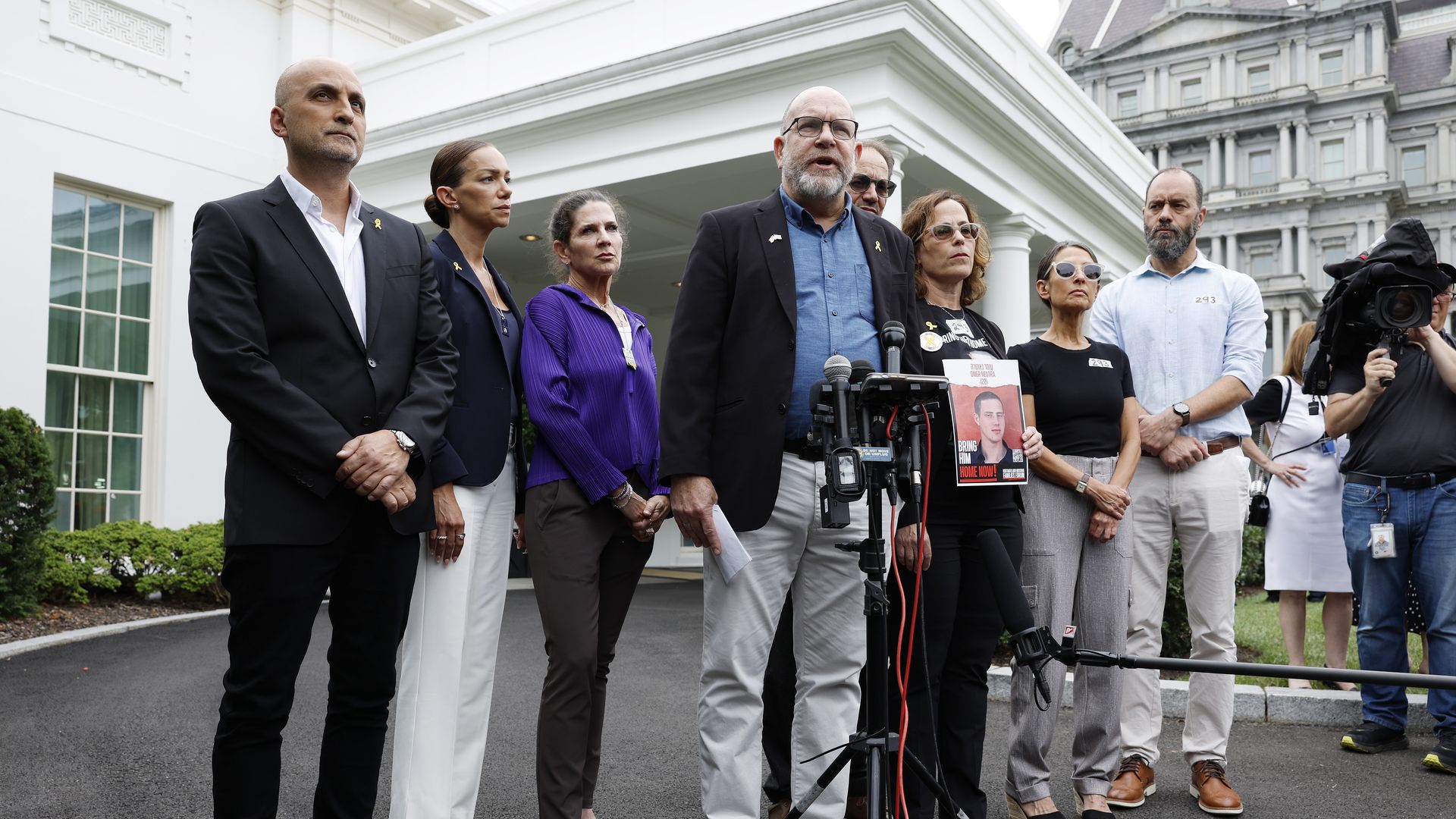 onathan Dekel-Chen, (second from left) speaks to reporters after he and other family members of American hostages being held by Hamas, participated in a meeting with U.S. President Joe Biden and Israeli Prime Minister Benjamin Netanyahu at the White House on July 25,