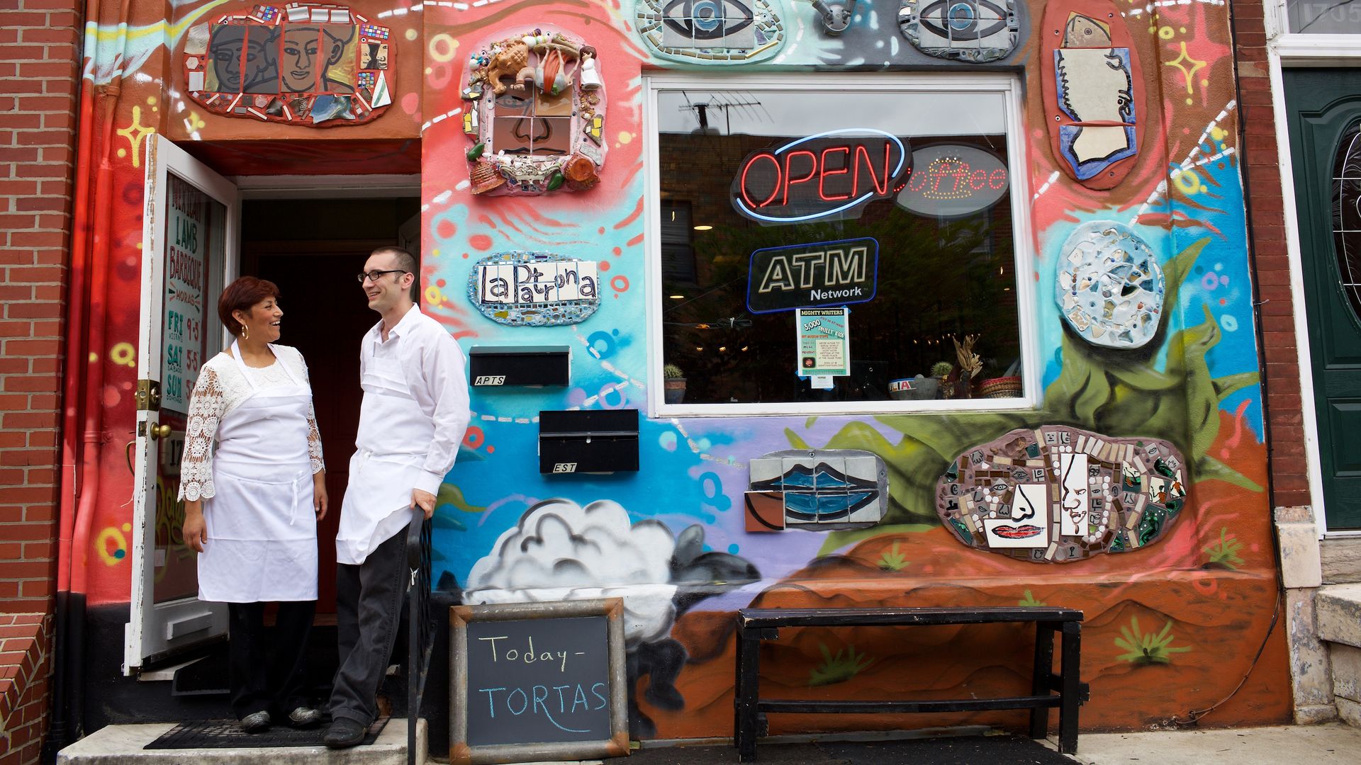 South Philly Barbocoa chefs Ben Miller Cristina Martinez outside their colorful restaurant.