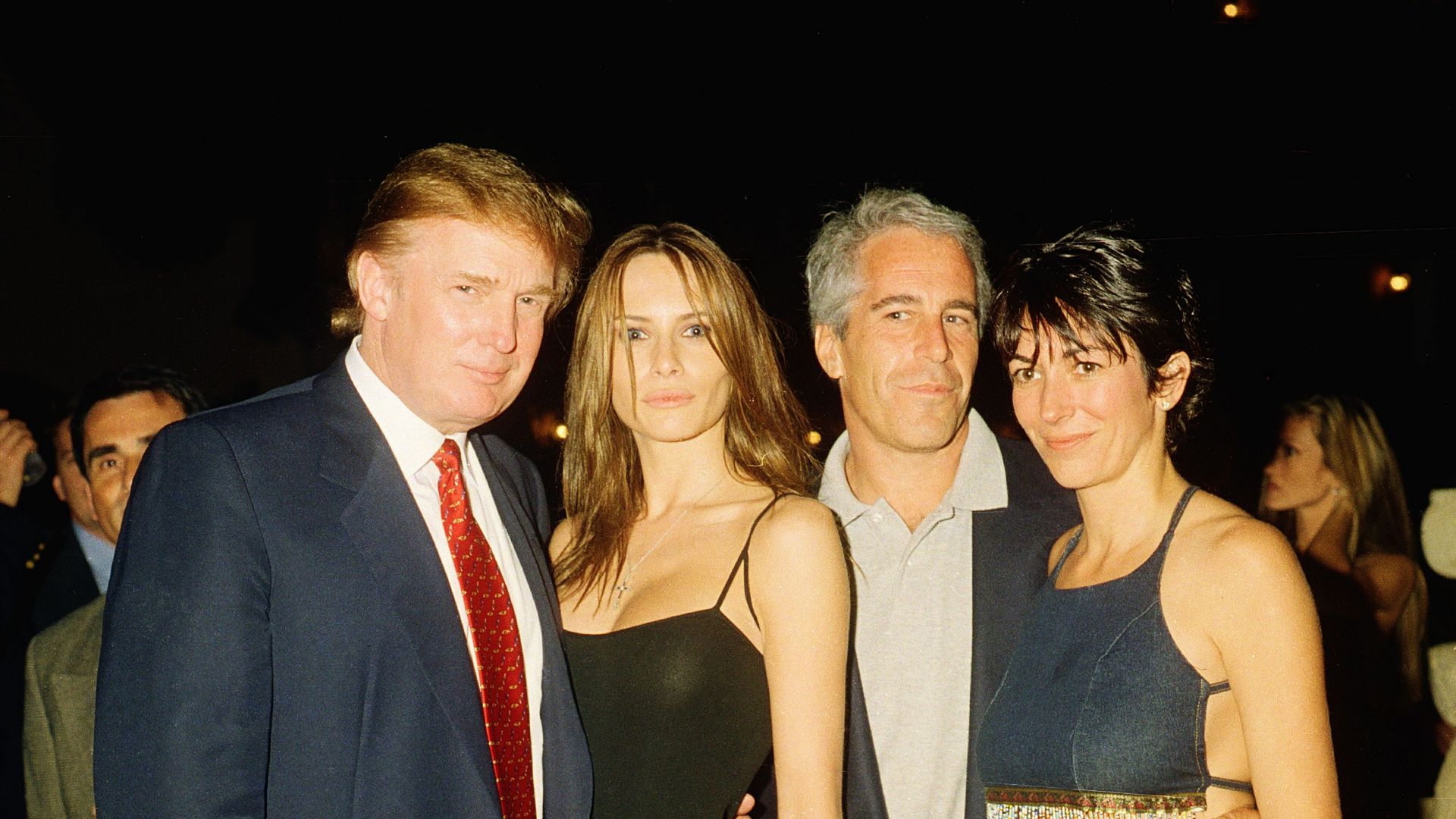 The Trumps, Epstein and Maxwell pose for a picture at a club