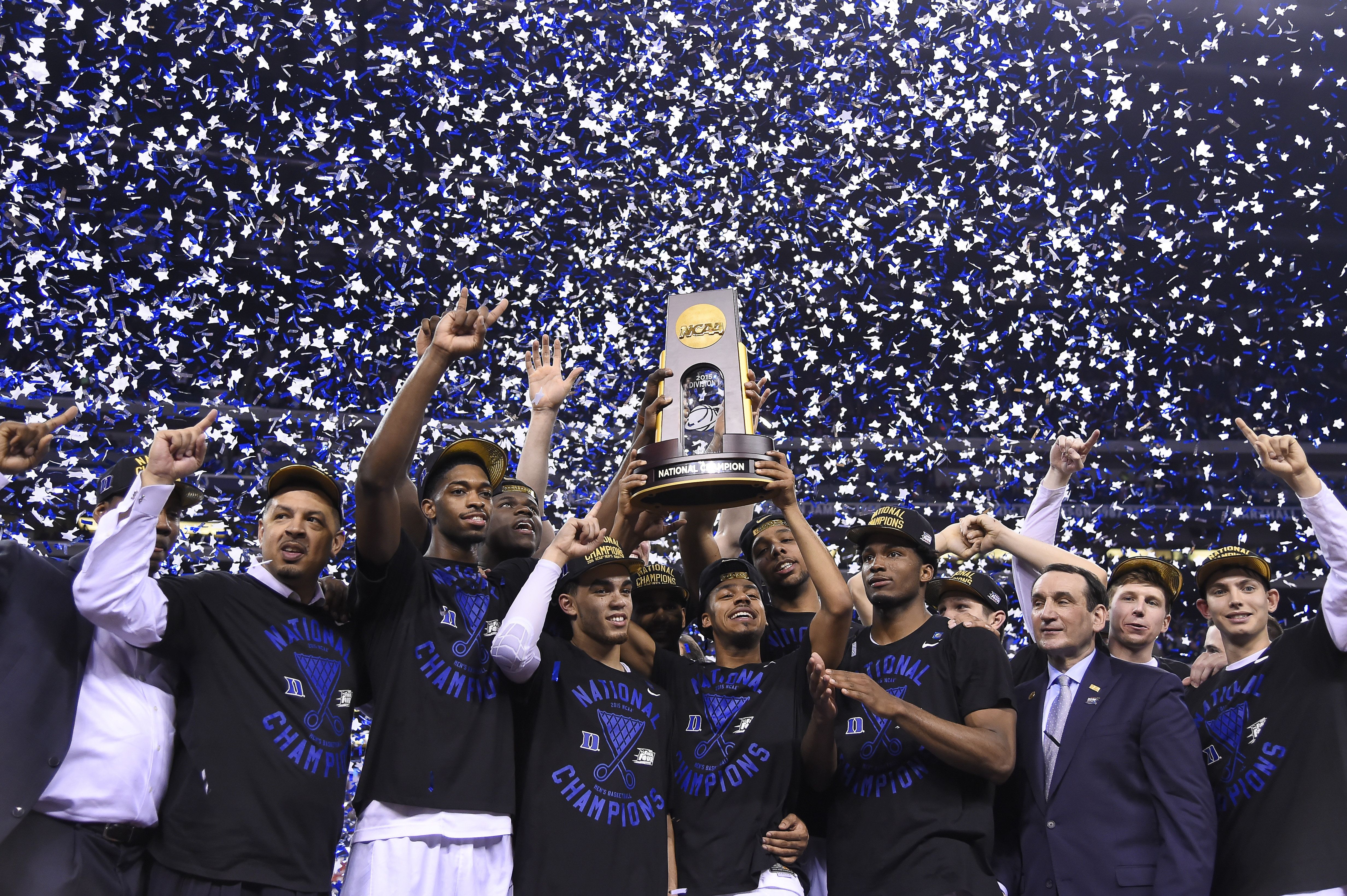 06 April 2015: Duke Blue Devils head coach Mike Krzyzewski celebrates with the Duke Blue Devils players, coachesand staff after winning the National Championship title by defeating the Wisconsin Badgers in action during the NCAA Championship Basketball game between the Wisconsin Badgers and the Duke Blue Devils, at the Lucas Oil Stadium, in Indianapolis, IN. (Photo by Robin Alam/Icon Sportswire/Corbis/Icon Sportswire via Getty Images)