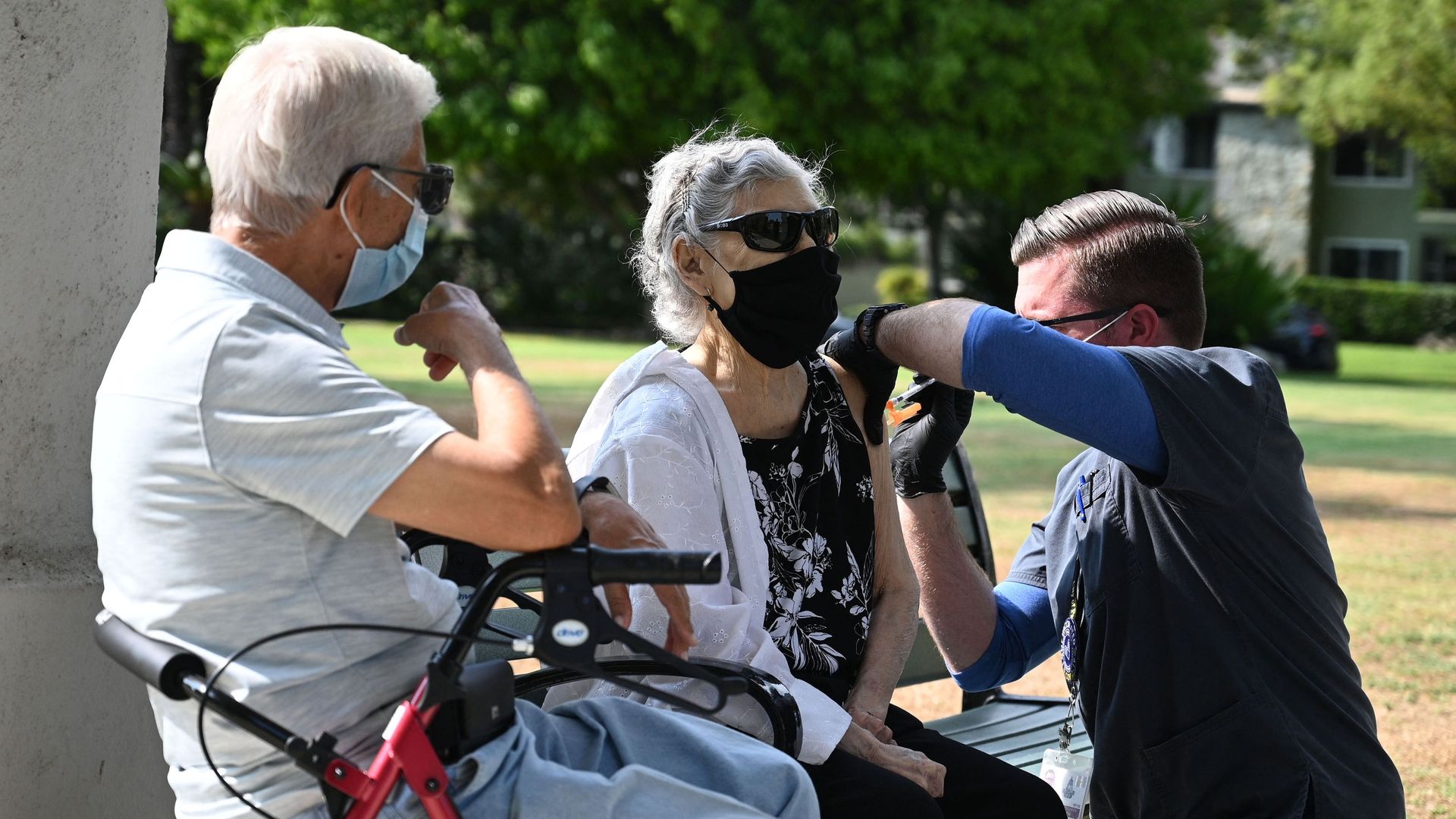 A nurse administering a booster shot of Pfizer's Covid-19 vaccine on Aug. 19 in Pasadena, California.