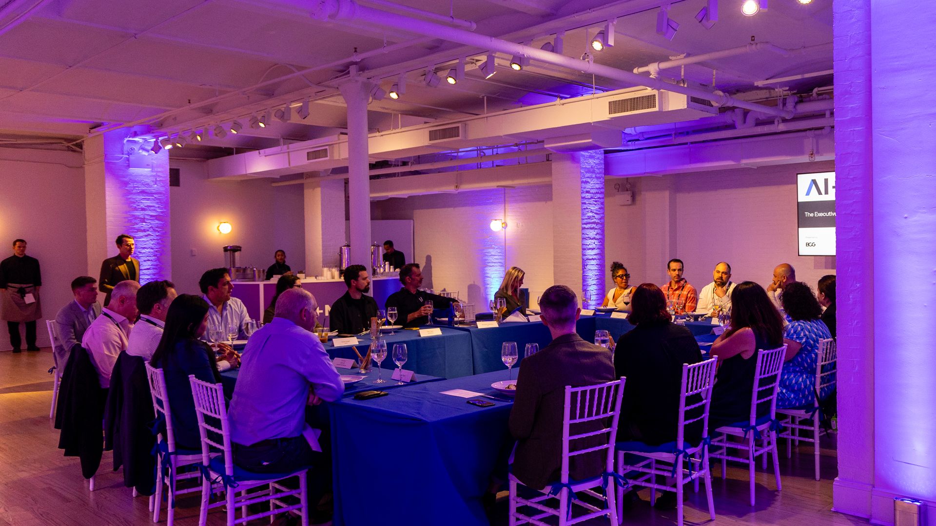 Attendees gathered around the table.