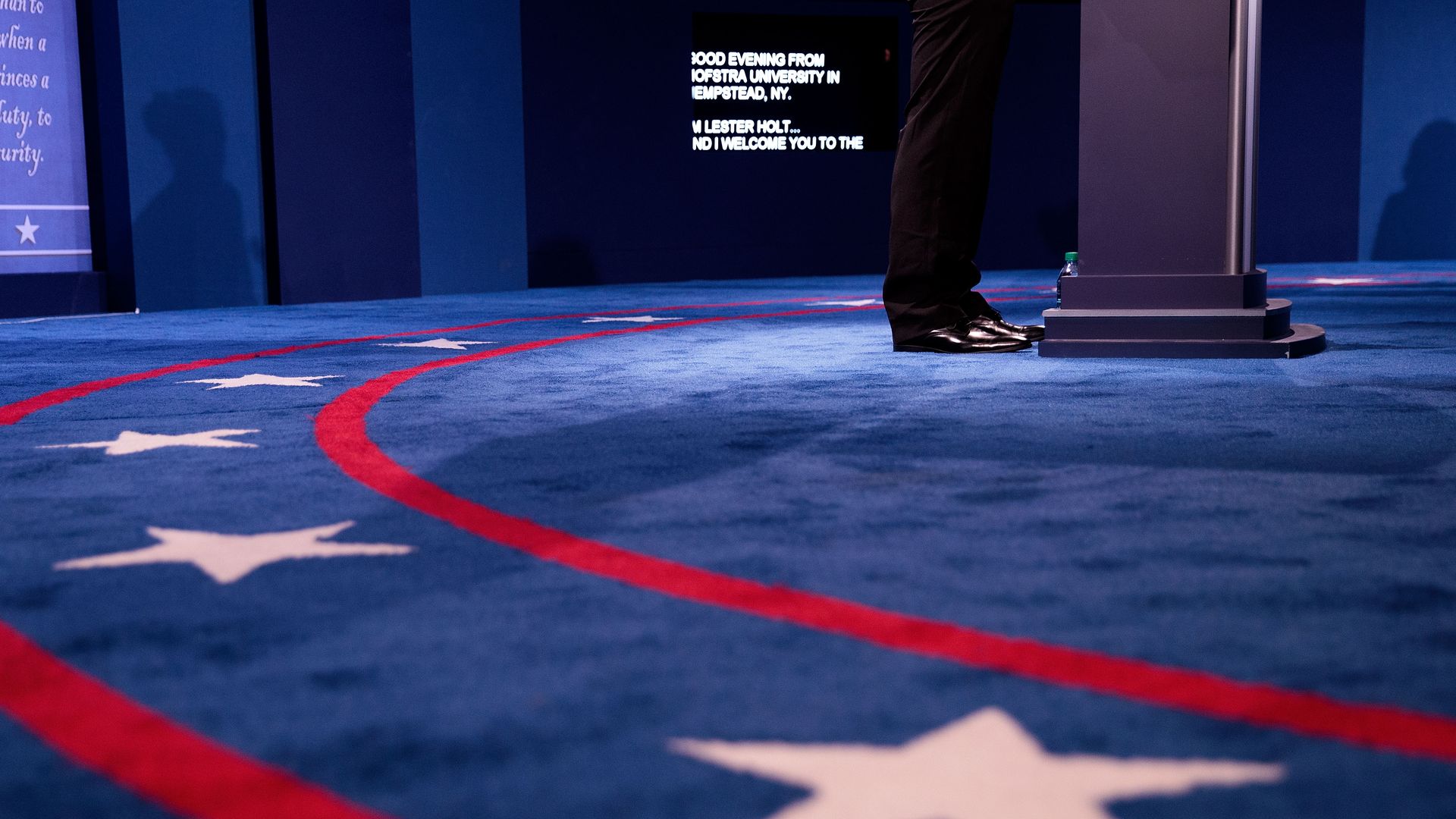 Students act as stand-ins before a presidential debate. 