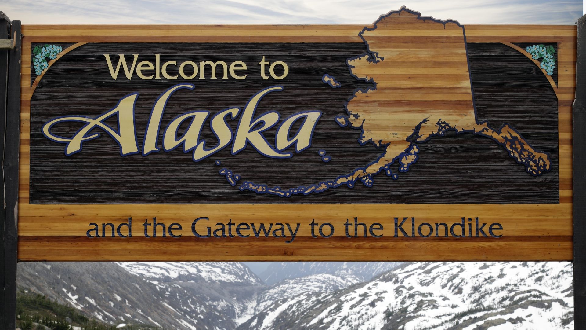 A welcome to alaska sign