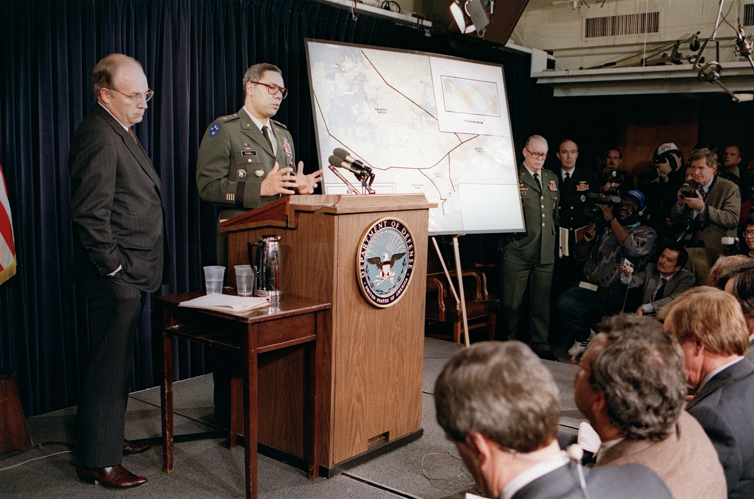 Colin Powell addressing the press about an invasion in Panama.