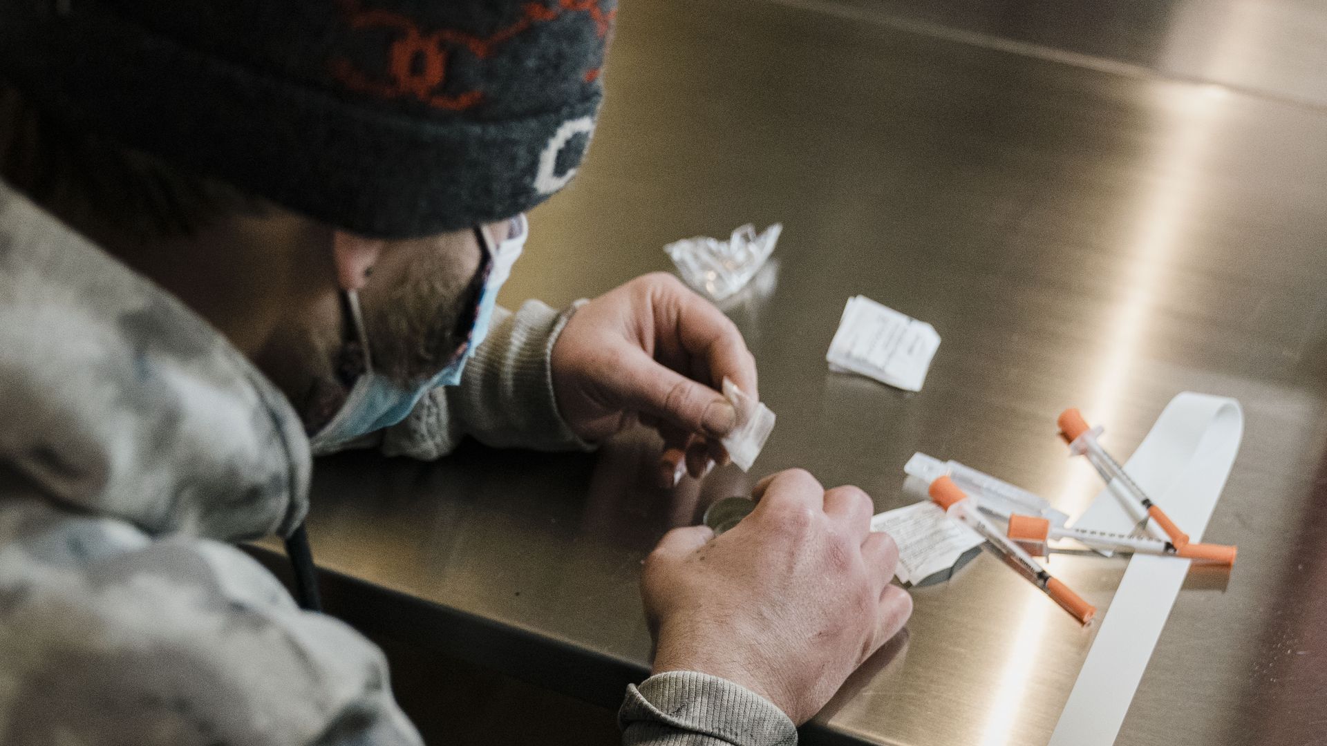 A man using narcotics.