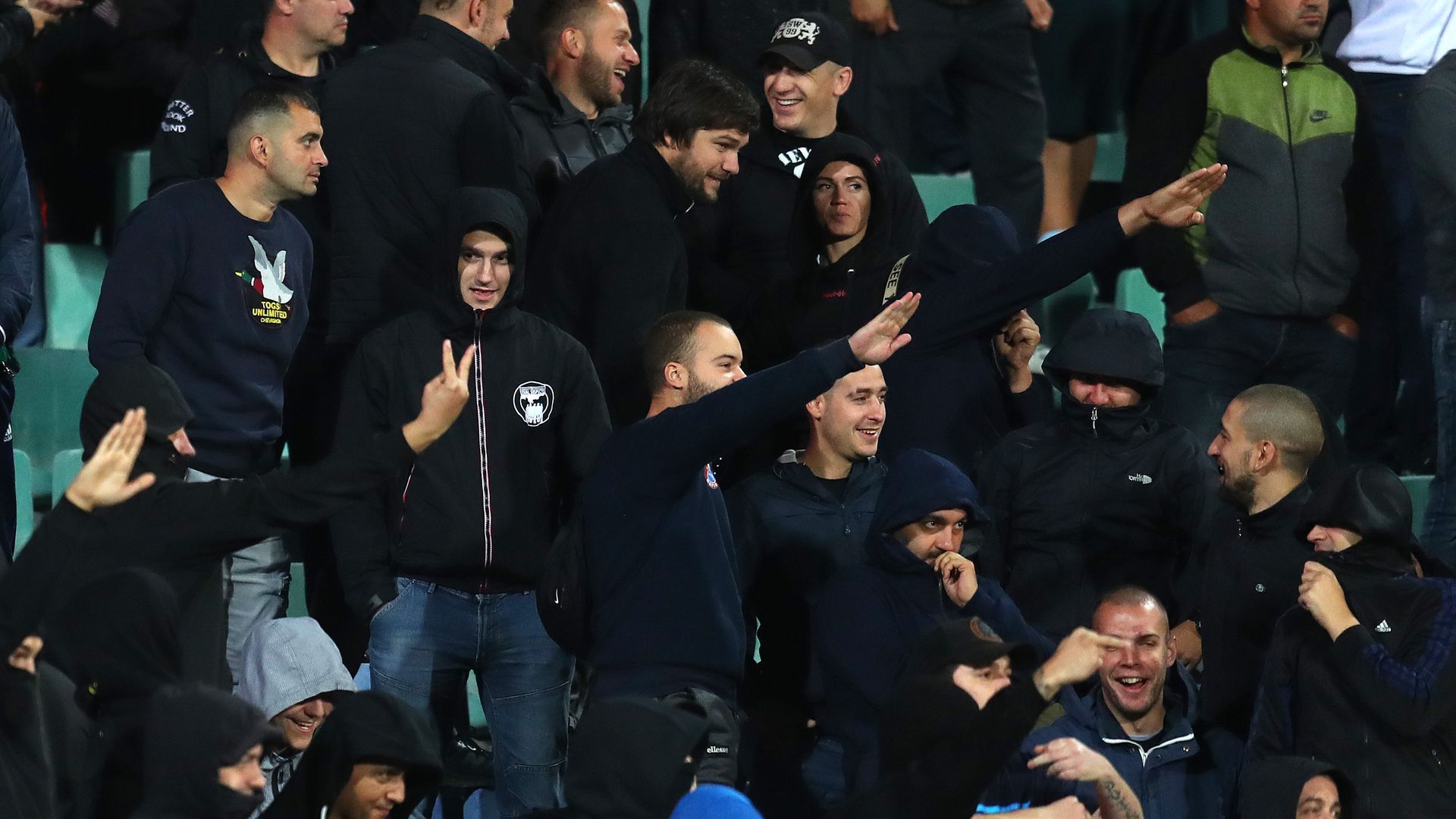 Bulgarian fans doing Nazi salutes.