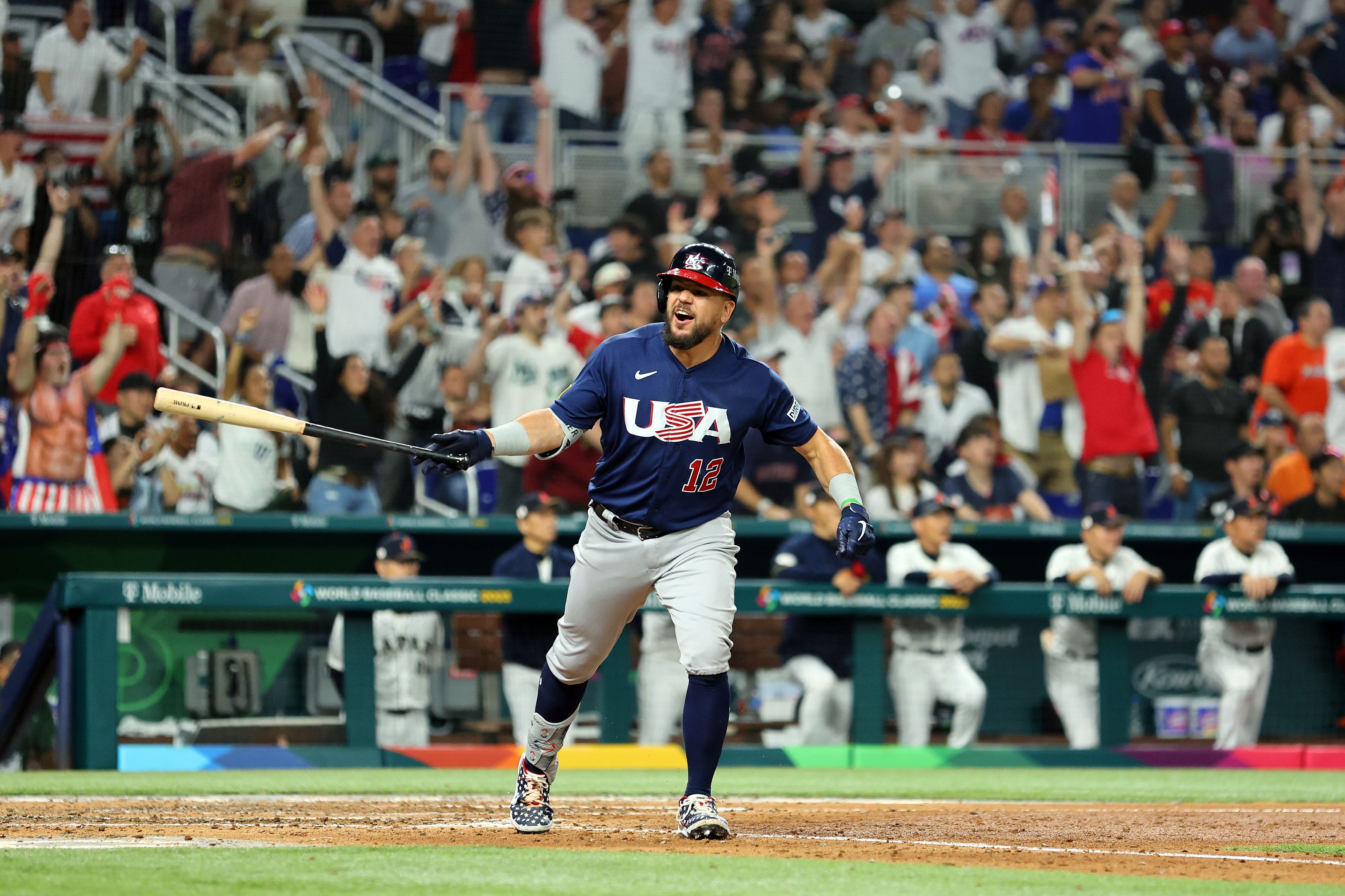 Kyle Schwarber #12 of Team USA reacts after hitting a solo home run in the eighth inning against Team Japan during the World Baseball Classic Championship on March 21, 2023 in Miami, Florida. 