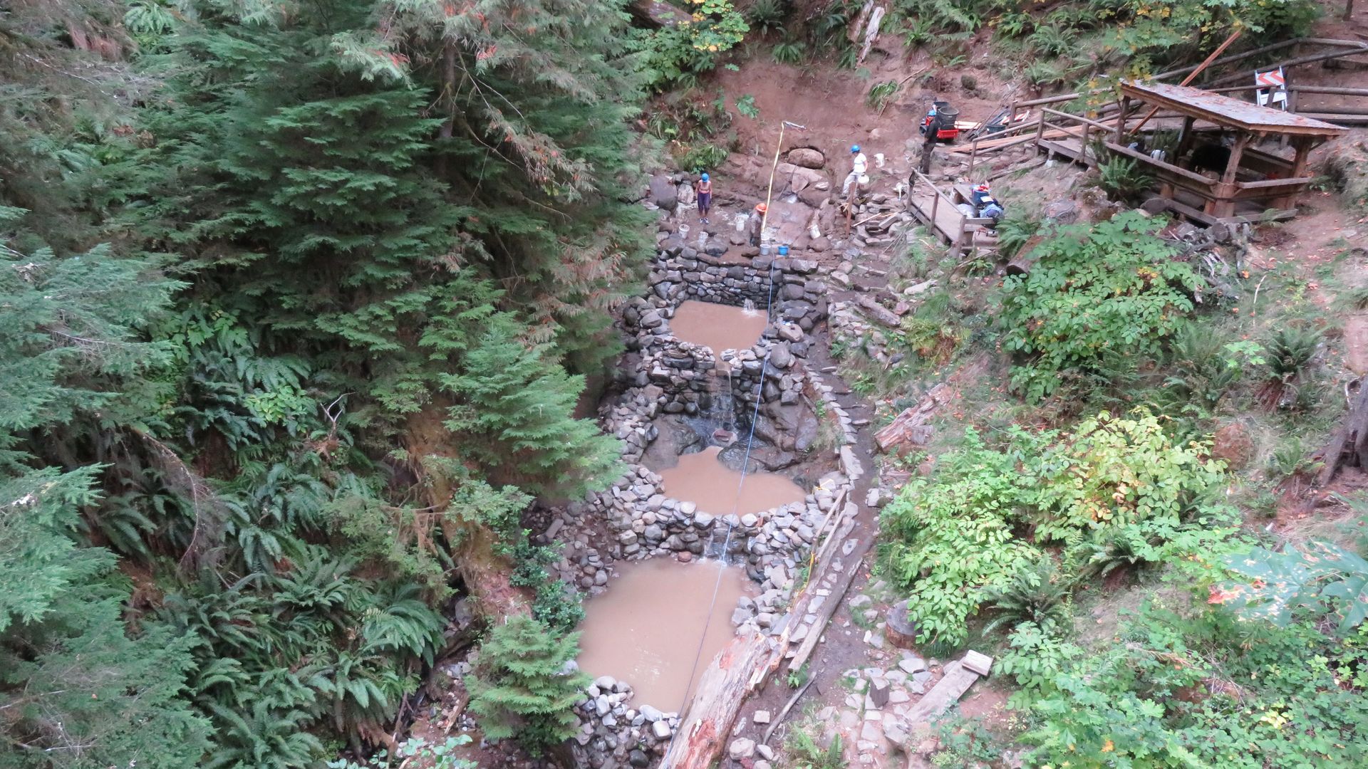 An aerial photo of three mineral hot springs.
