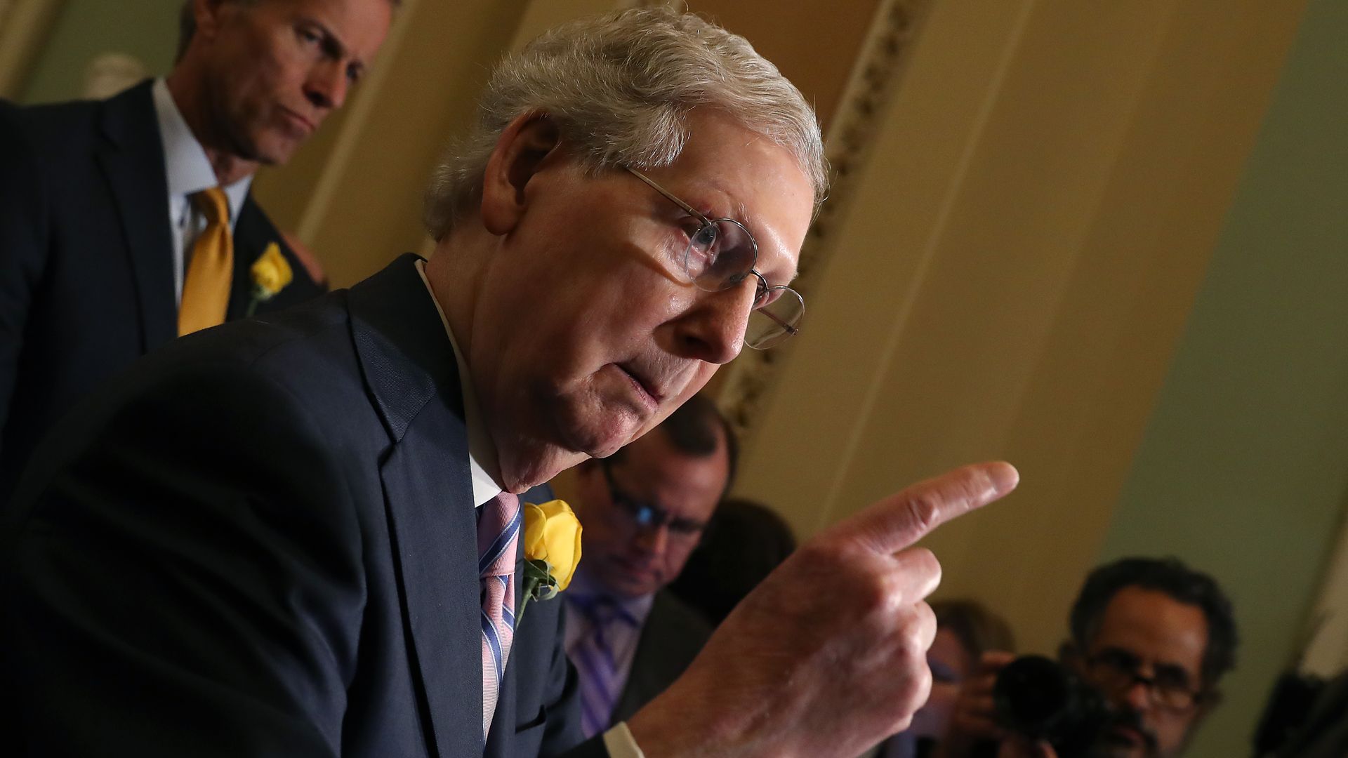 In this image, McConnell speaks while pointing a finger.