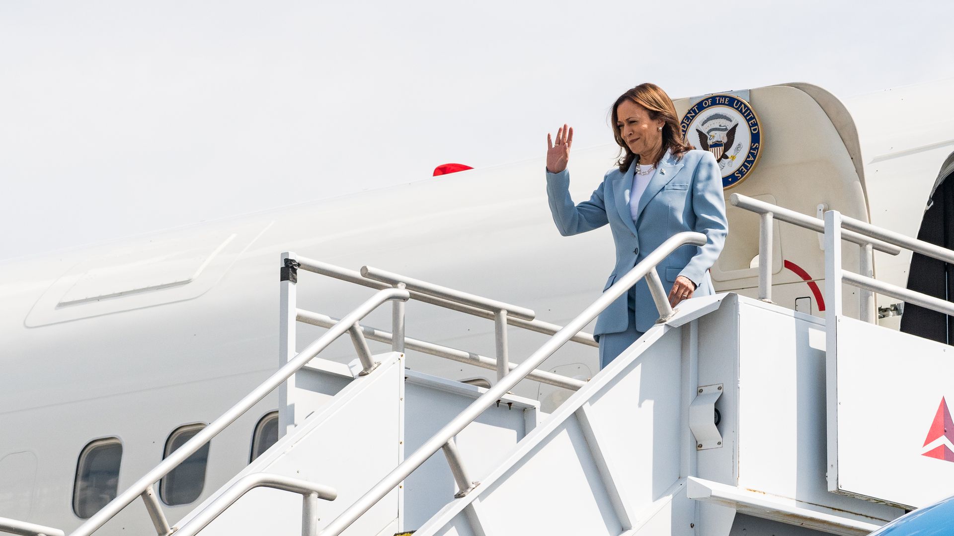 Harris alights from Air Force Two