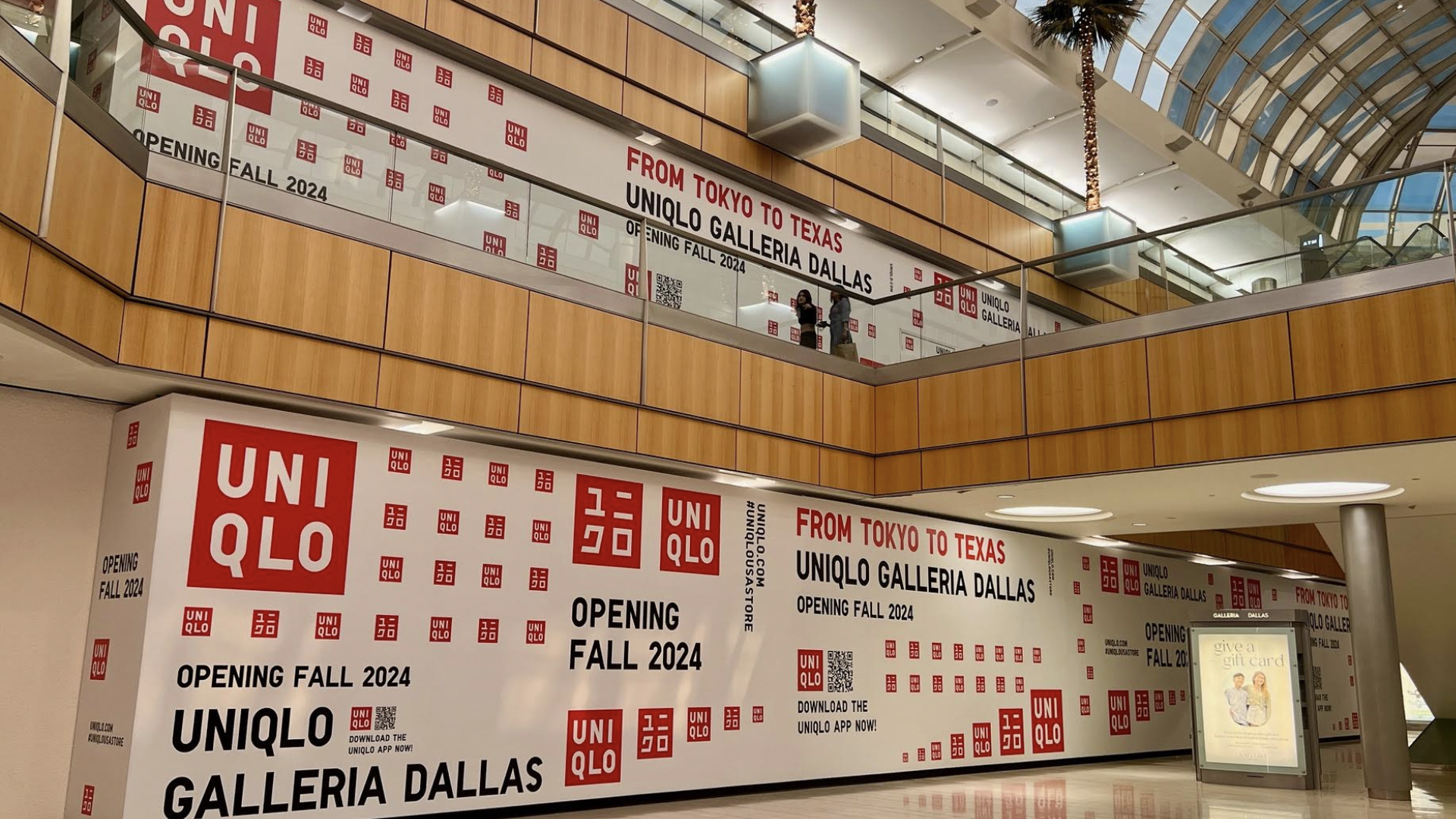 White, black and red wrapping for a Uniqlo store at a mall