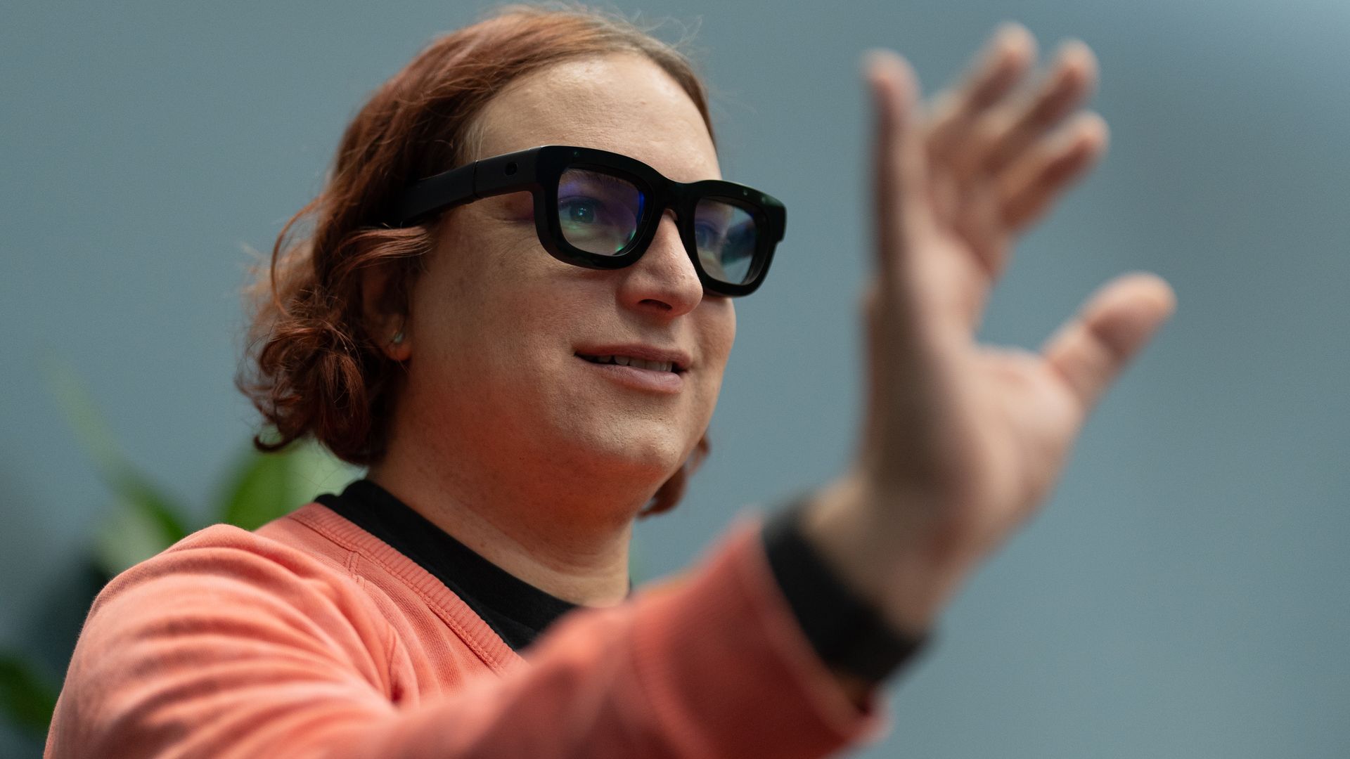 Axios' Ina Fried trying out Meta's Orion augmented reality glasses.