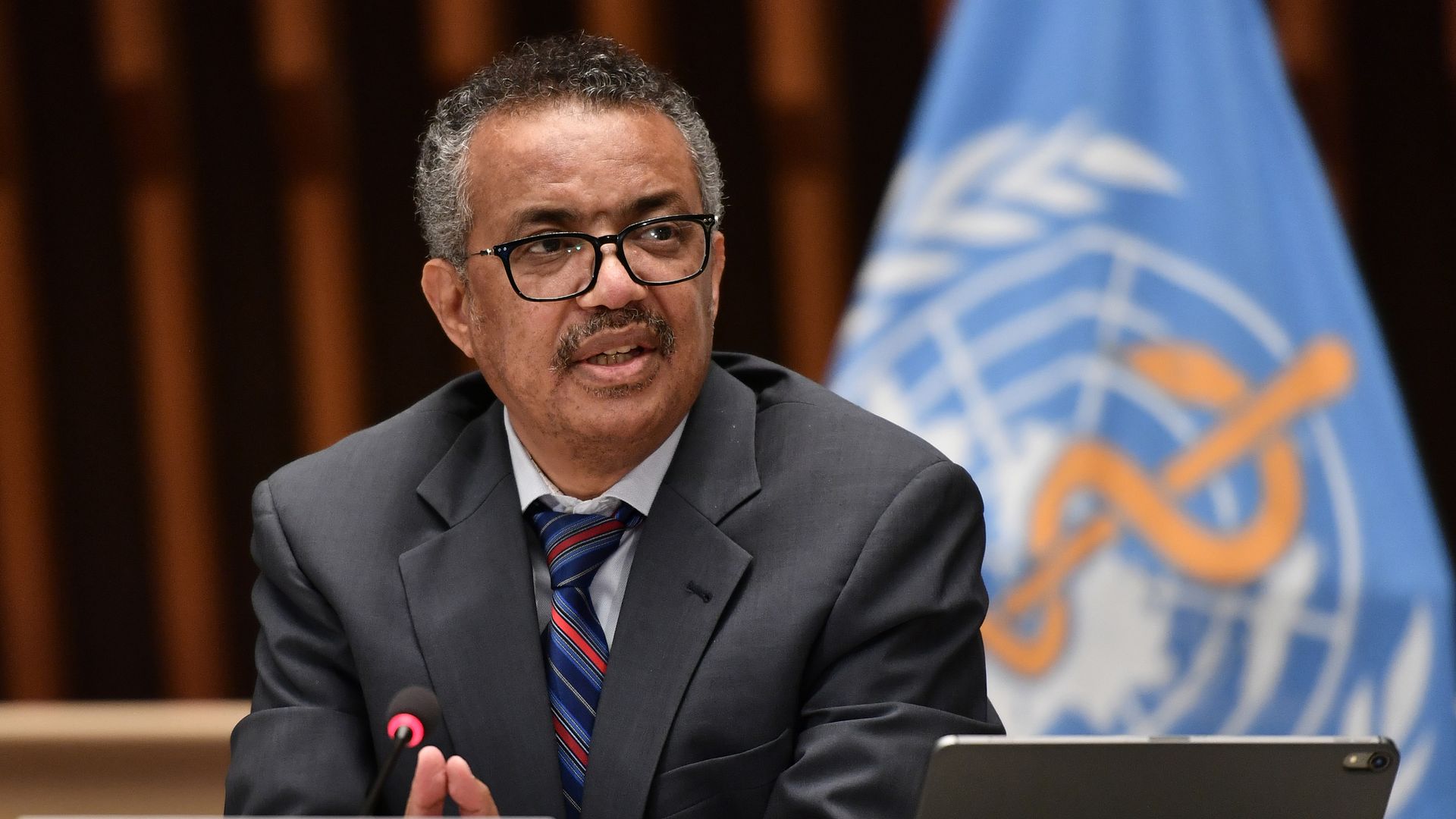 Photo of Tedros Adhanom Ghebreyesus speaking at a WHO meeting