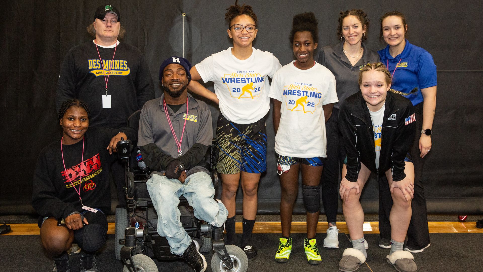 Kendric Birden along with wrestling athletes at pictured together