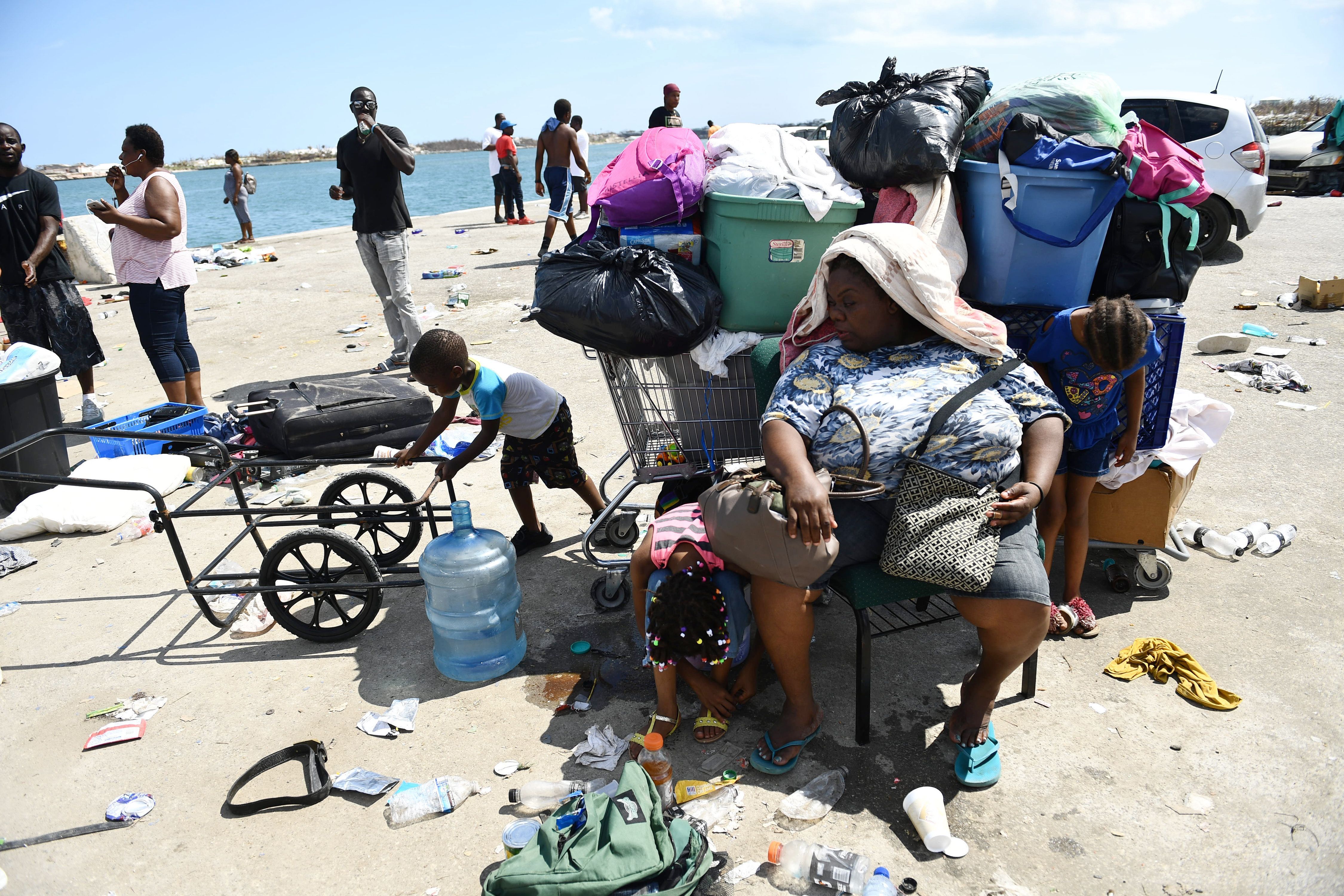 Christine Joseph and others await evacuation at a dock in Marsh Harbour, Bahamas, on September 7