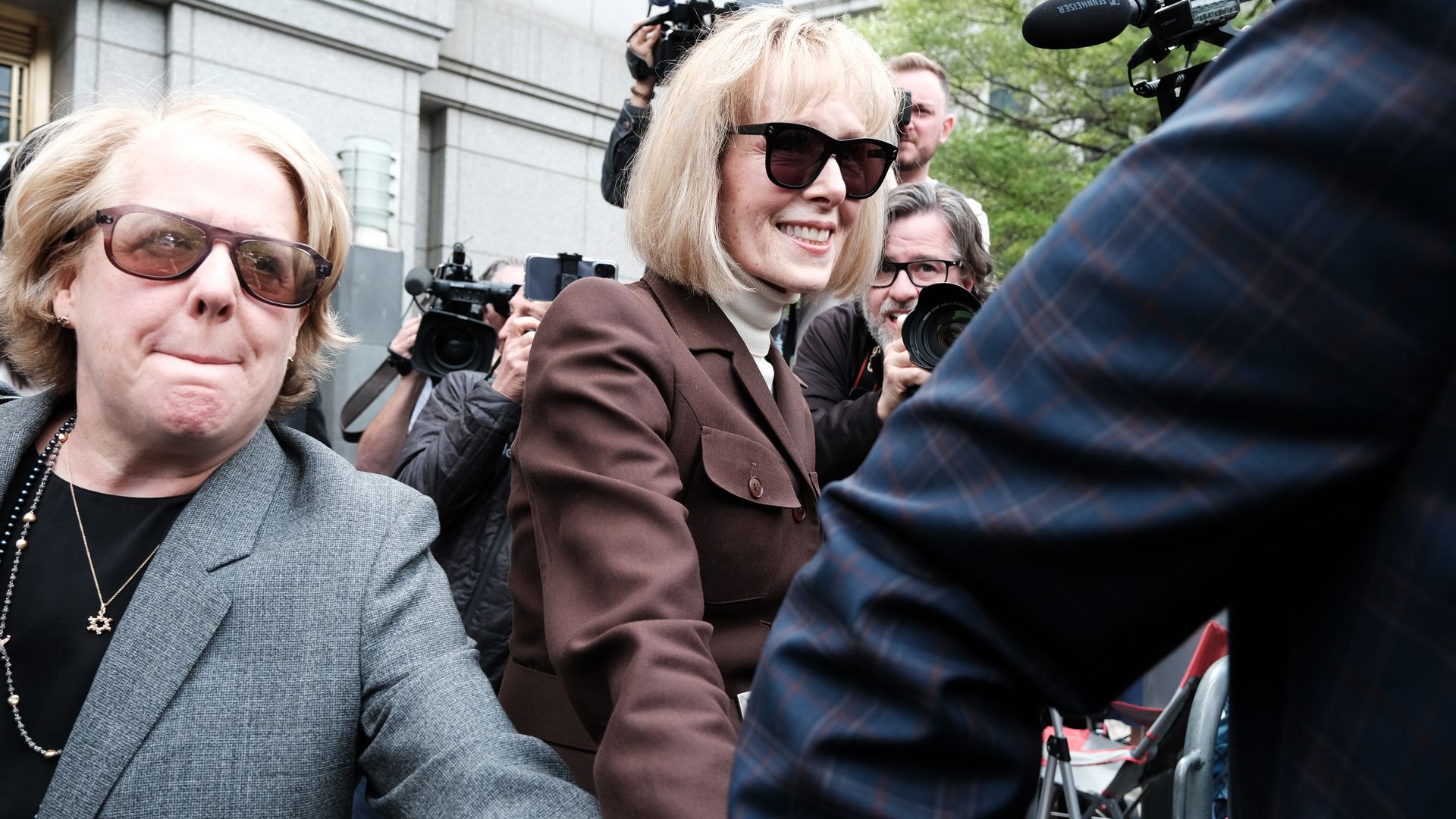 Writer E. Jean Carroll (right) with her counsel Roberta Kaplan (left) outside of a courthouse in New York City in May 2023.