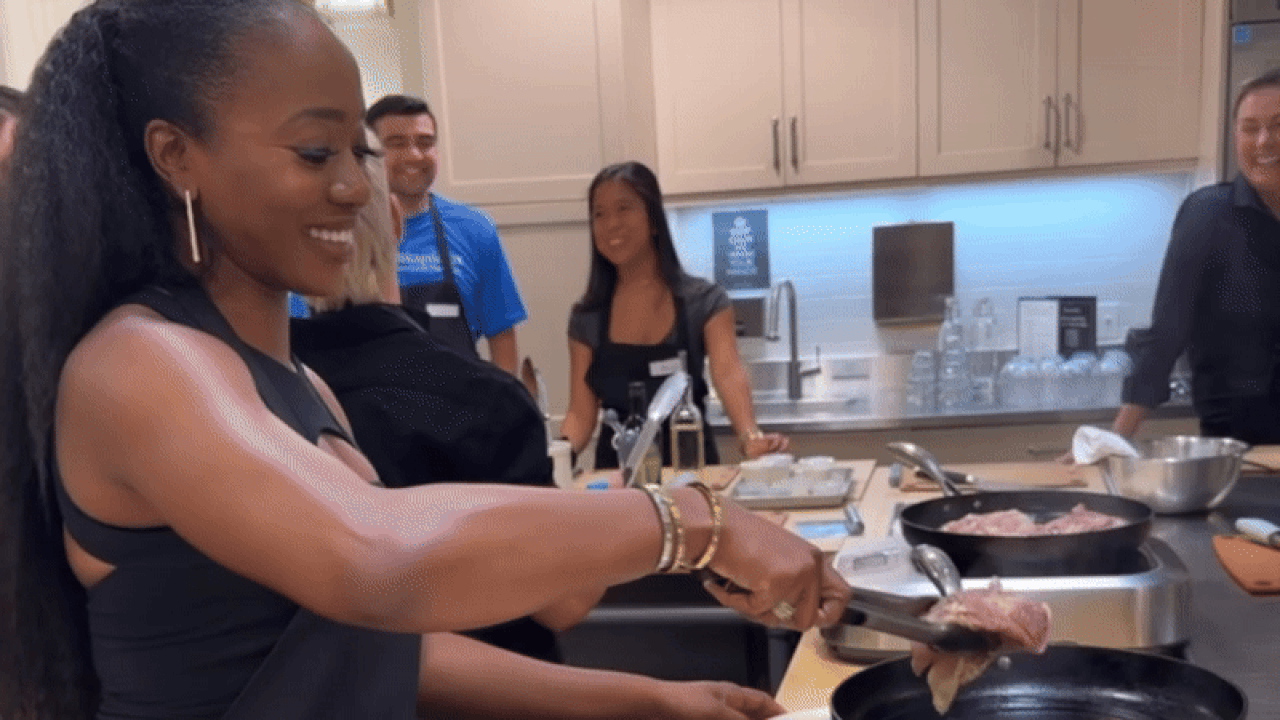 Cooking roasted chicken with tarragon cream sauce at Sur La Table. 