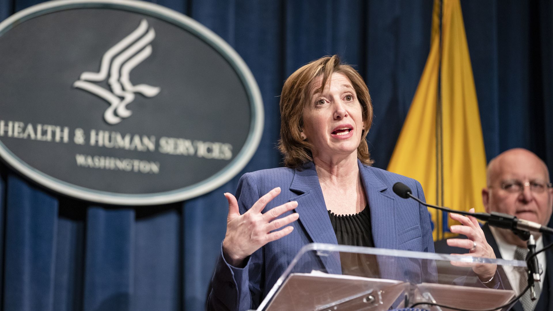 CDC official holding a press conference.