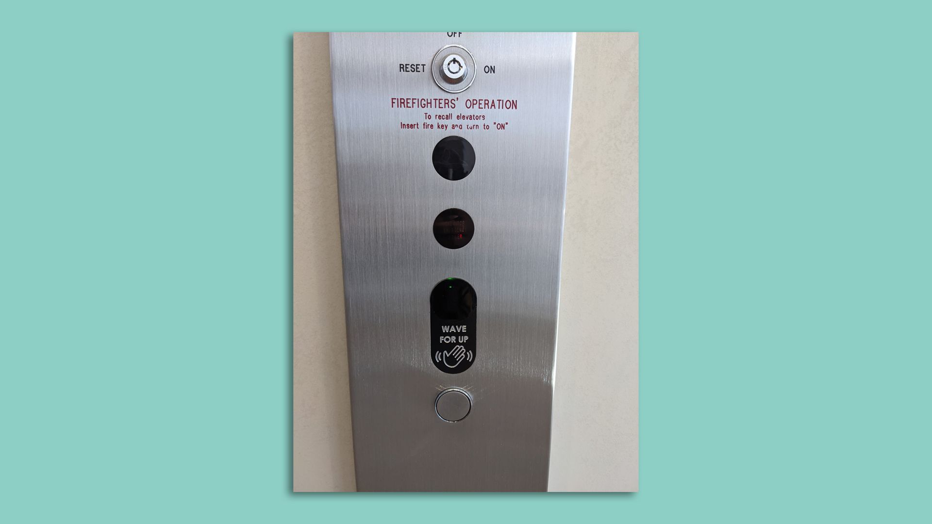 An elevator button that includes a haptic option — marked 