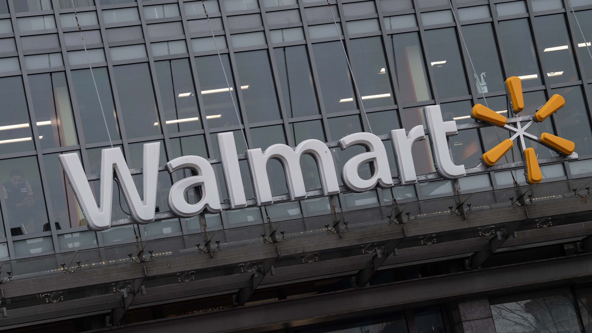 A Walmart entrance sign.