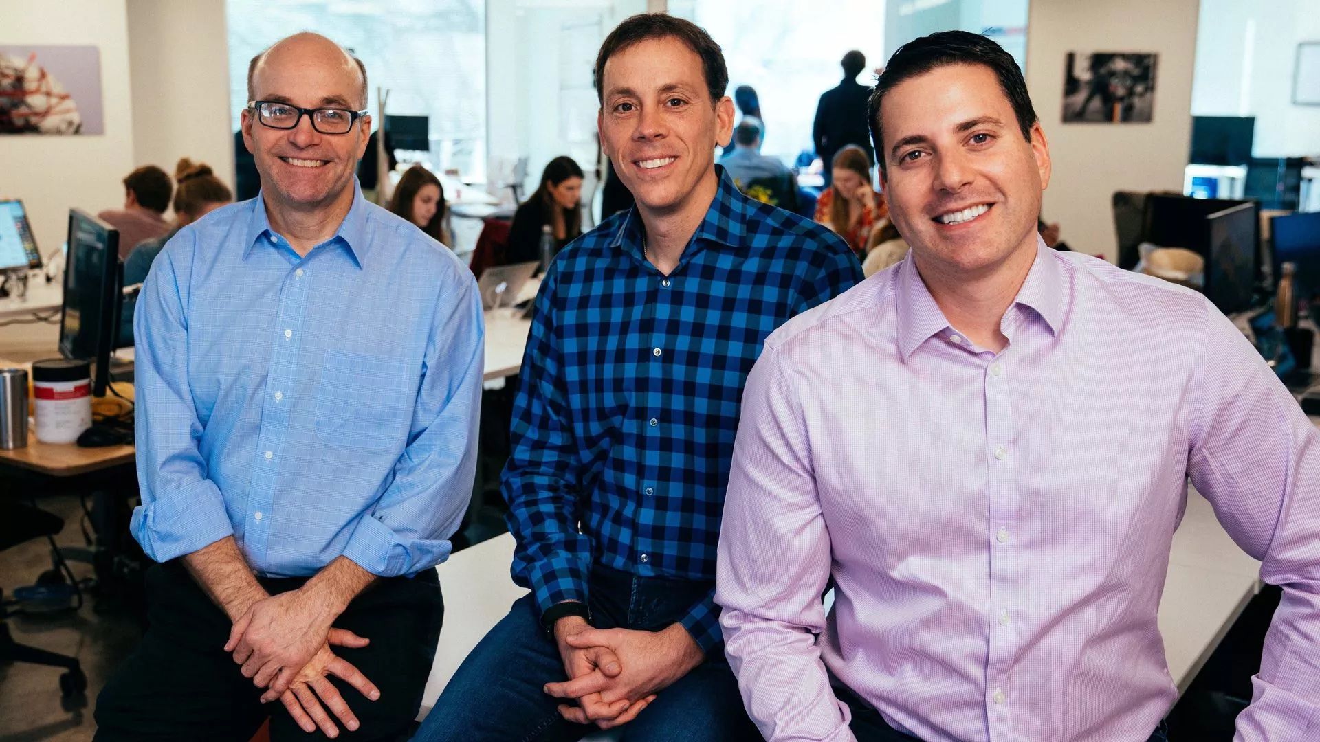 Axios co-founders Mike Allen, Jim VandeHei and Roy Schwartz in the Axios newsroom.