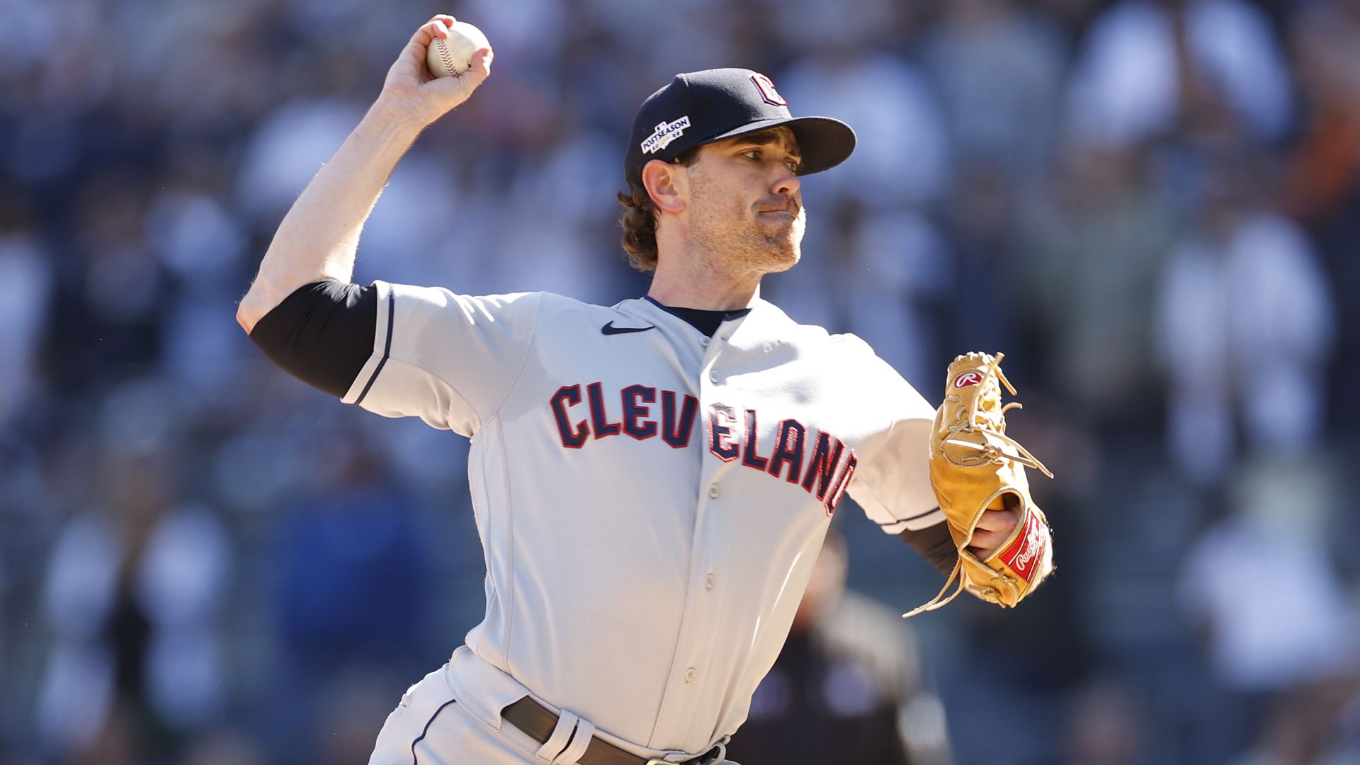 Cleveland Guardians' Shane Bieber pitches the ball. 