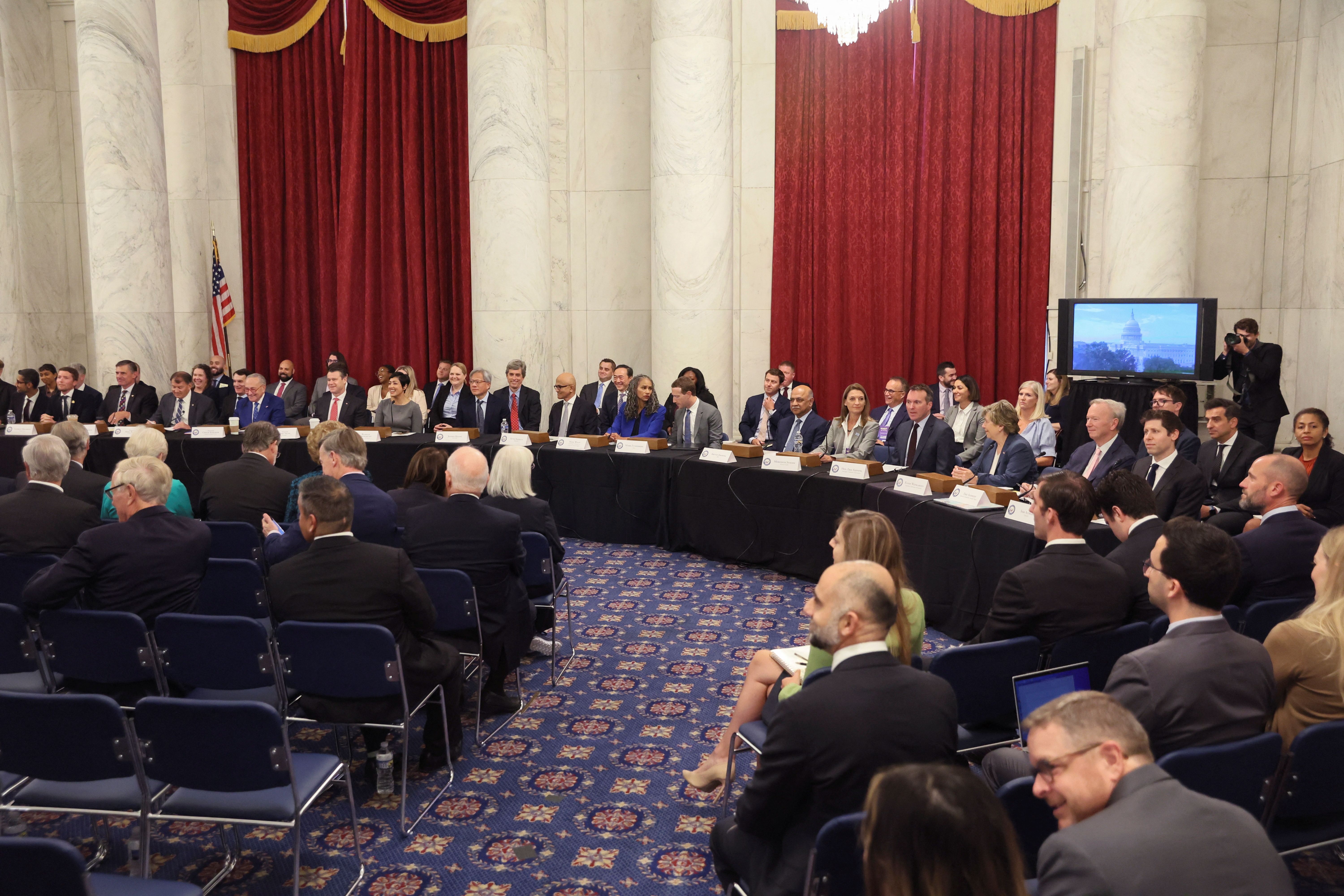 Top U.S. technology leaders including Tesla CEO Elon Musk, Meta Platforms CEO Mark Zuckerberg, Alphabet CEO Sundar Pichai, OpenAI CEO Sam Altman, Nvidia CEO Jensen Huang, Microsoft CEO Satya Nadella, IBM CEO Arvind Krishna and former Microsoft CEO Bill Gates take their seats for the start of a bipartisan Artificial Intelligence.