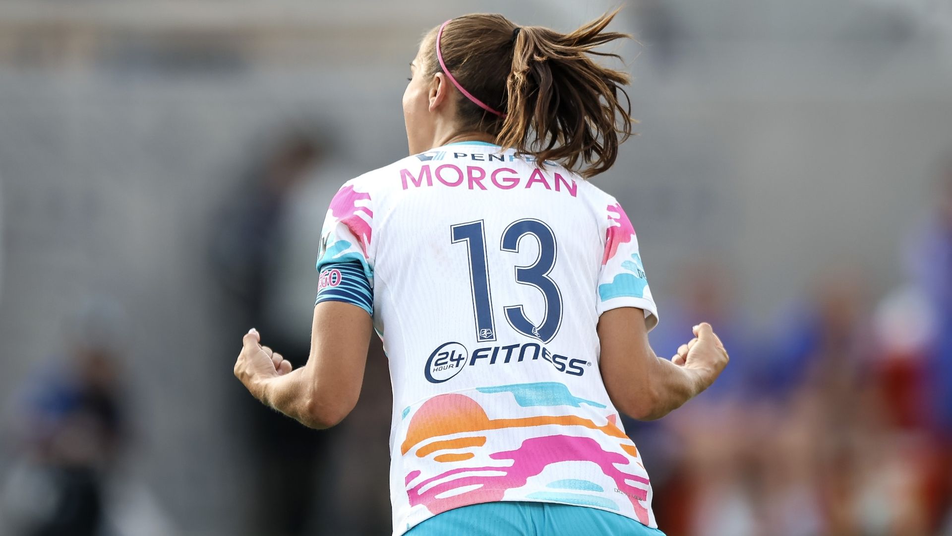 Alex Morgan #13 of San Diego Wave FC reacts after a goal.