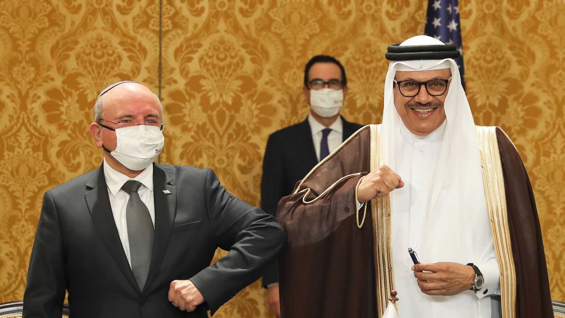 Israeli and Bahraini officials bump elbows