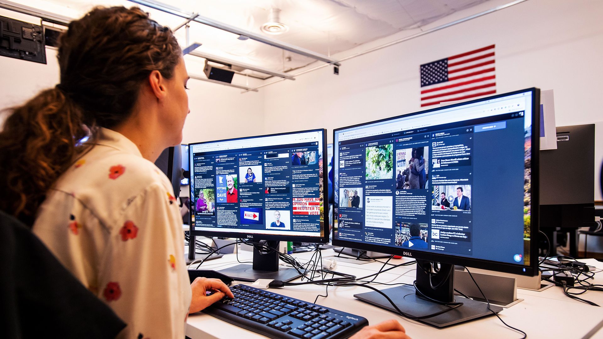 War room leader for Brazil elections Lexi Sturdy works in Facebook's "War Room," during a media demonstration on October 17, 2018, in Menlo Park, California.