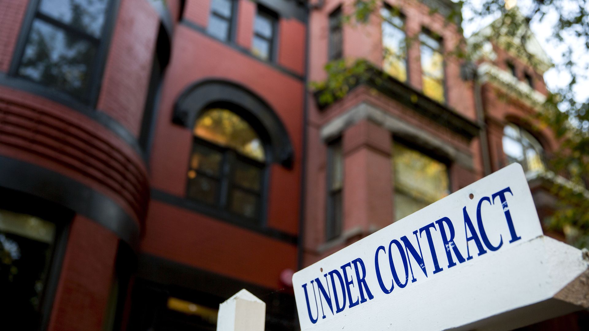 An 'Under Contract' sign outside of a D.C. townhome.