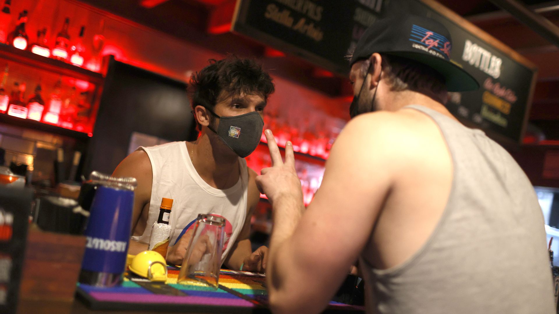 Person ordering two drinks