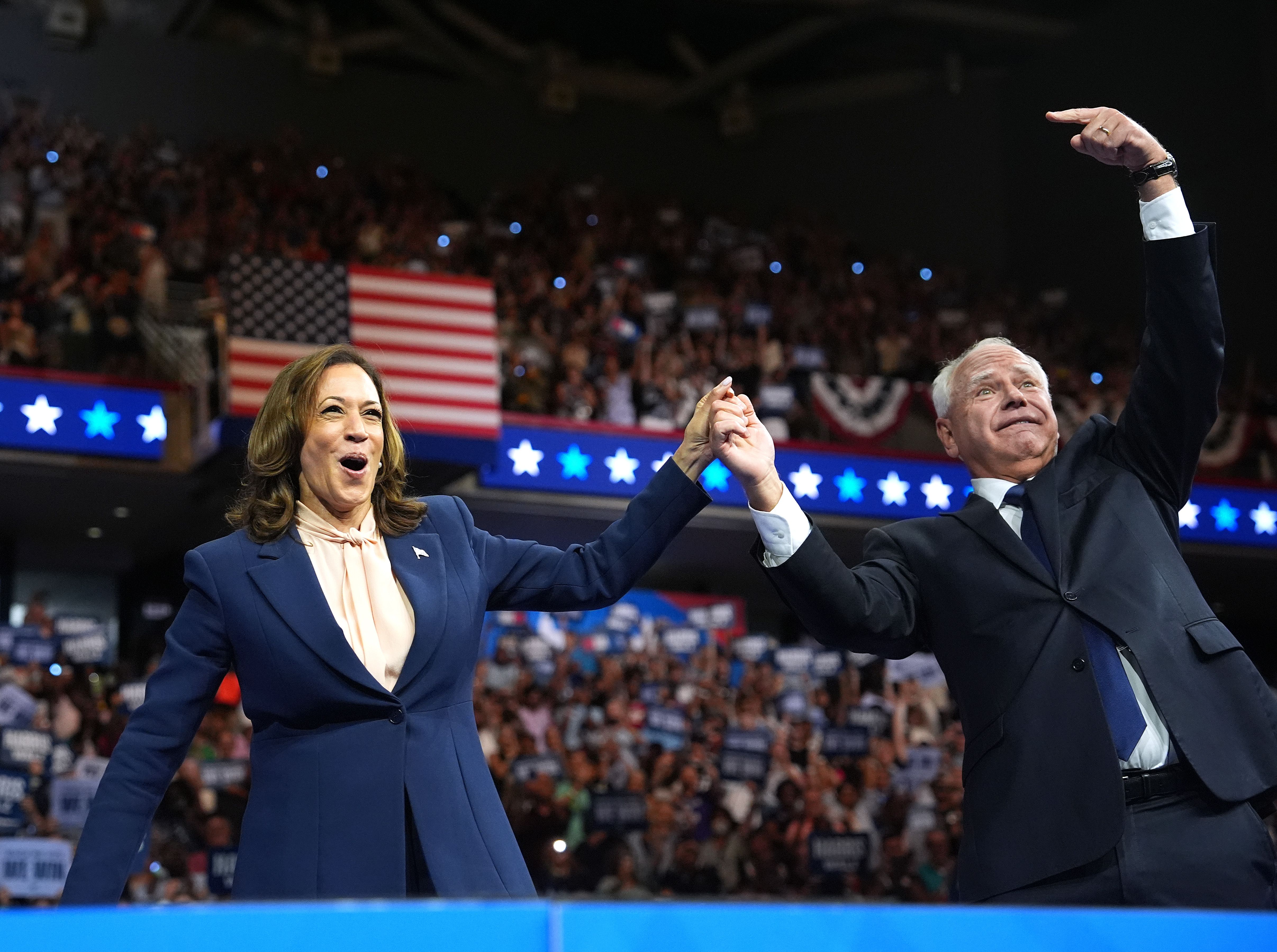 : Democratic presidential candidate, U.S. Vice President Kamala Harris and Democratic vice presidential candidate Minnesota Gov. Tim Walz greets supporters during a campaign event at Girard College on August 6, 2024 in Philadelphia