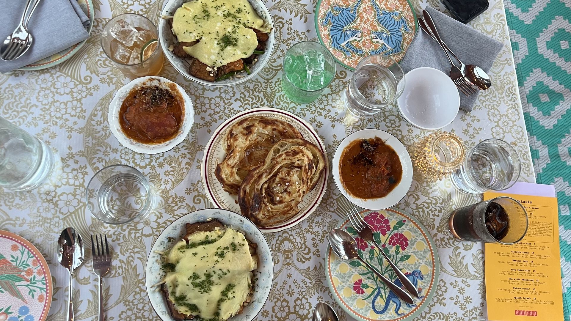 Photo of a dining table with a few dishes.