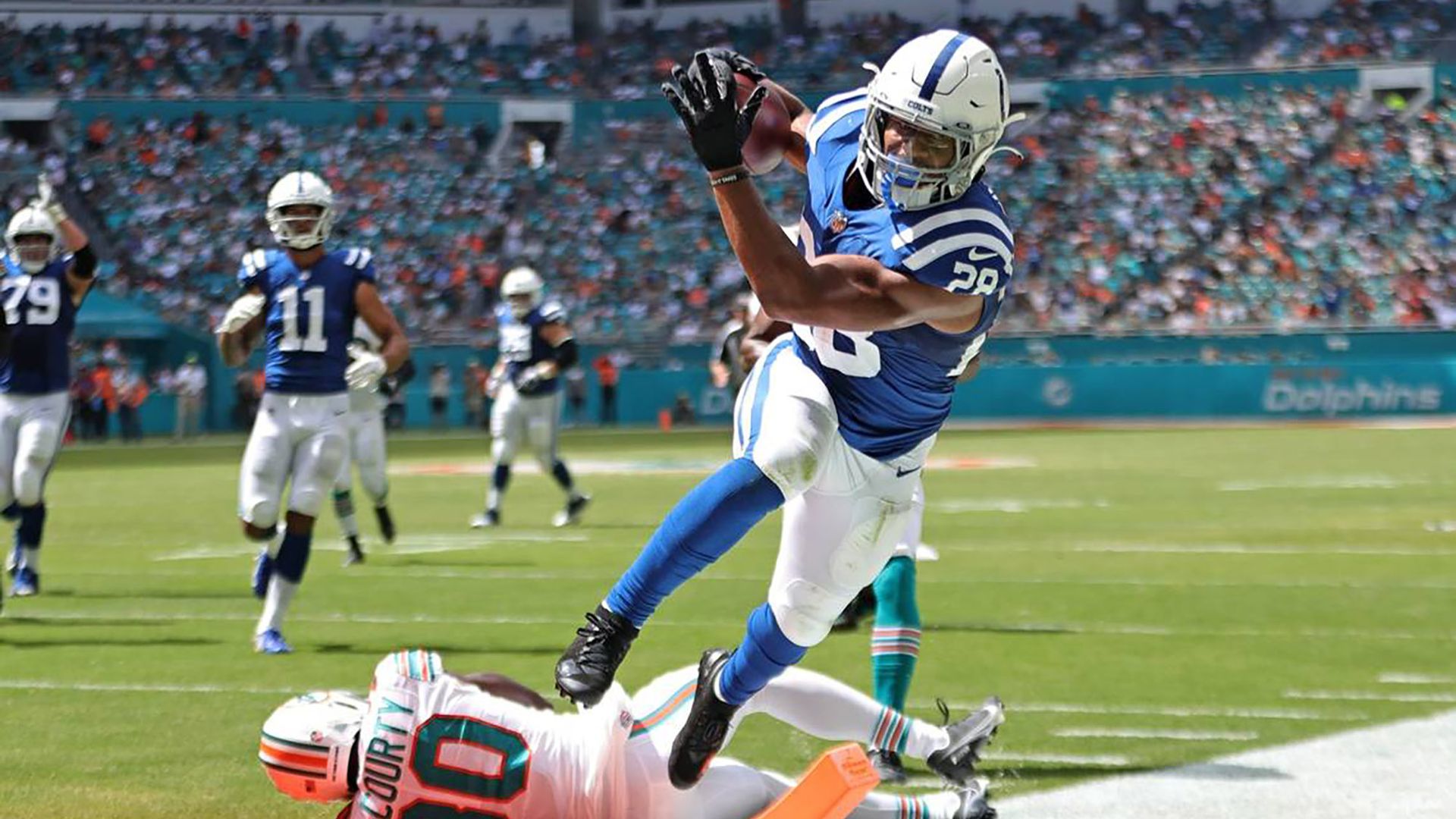 Indianapolis Colts running back Jonathan Taylor (28) scores a touchdown against the Miami Dolphins at Hard Rock Stadium on Oct. 3, 2021, in Miami Gardens, 