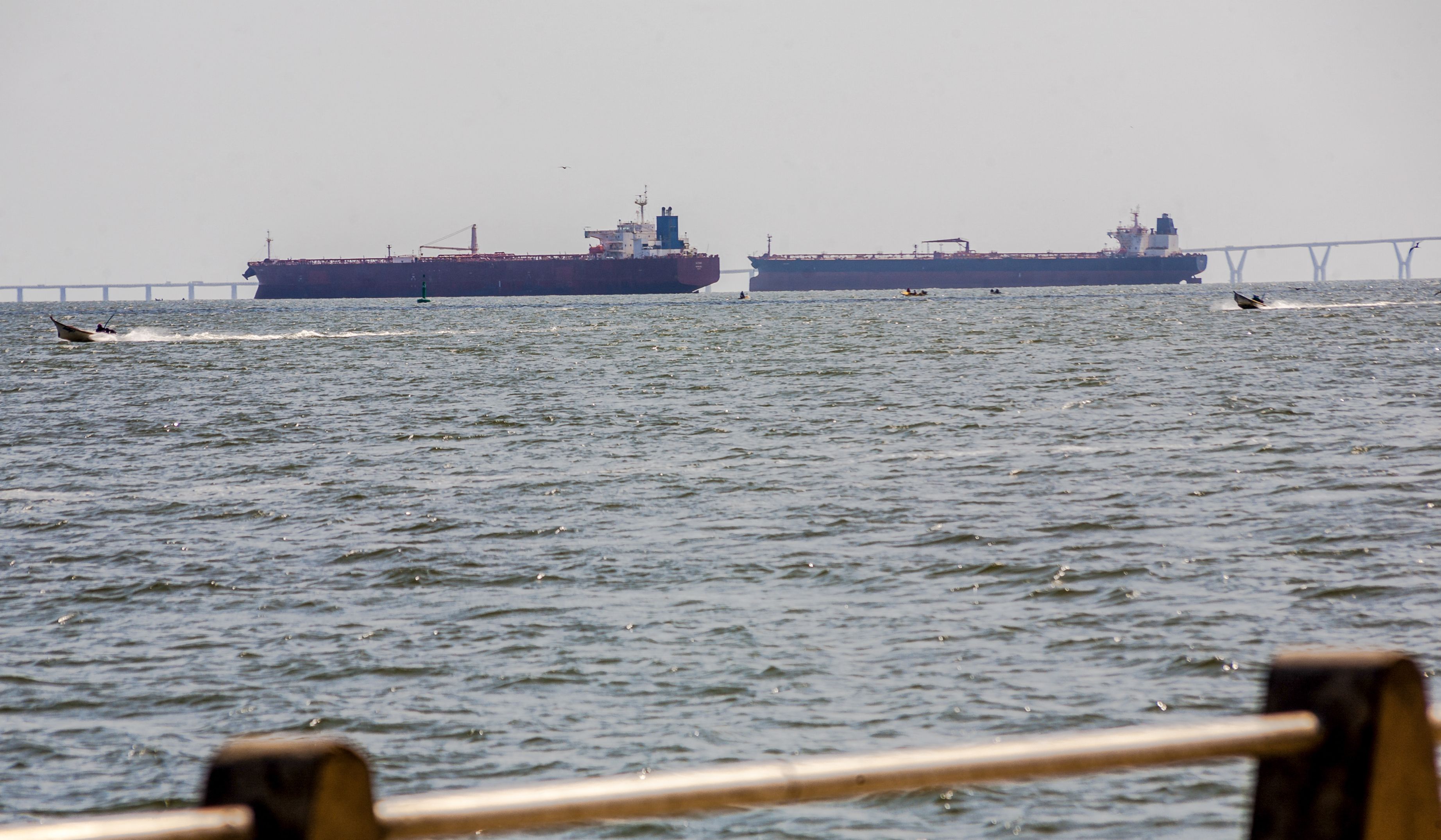 Two crude oil tankers remain anchored on Lake Maracaibo in Venezuela on Dec. 17. Photo: Alejandro Paredes / AFP via Getty Images