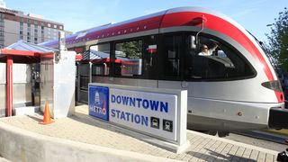 Cap Metro Red Line trail pictured stopped at downtown station.