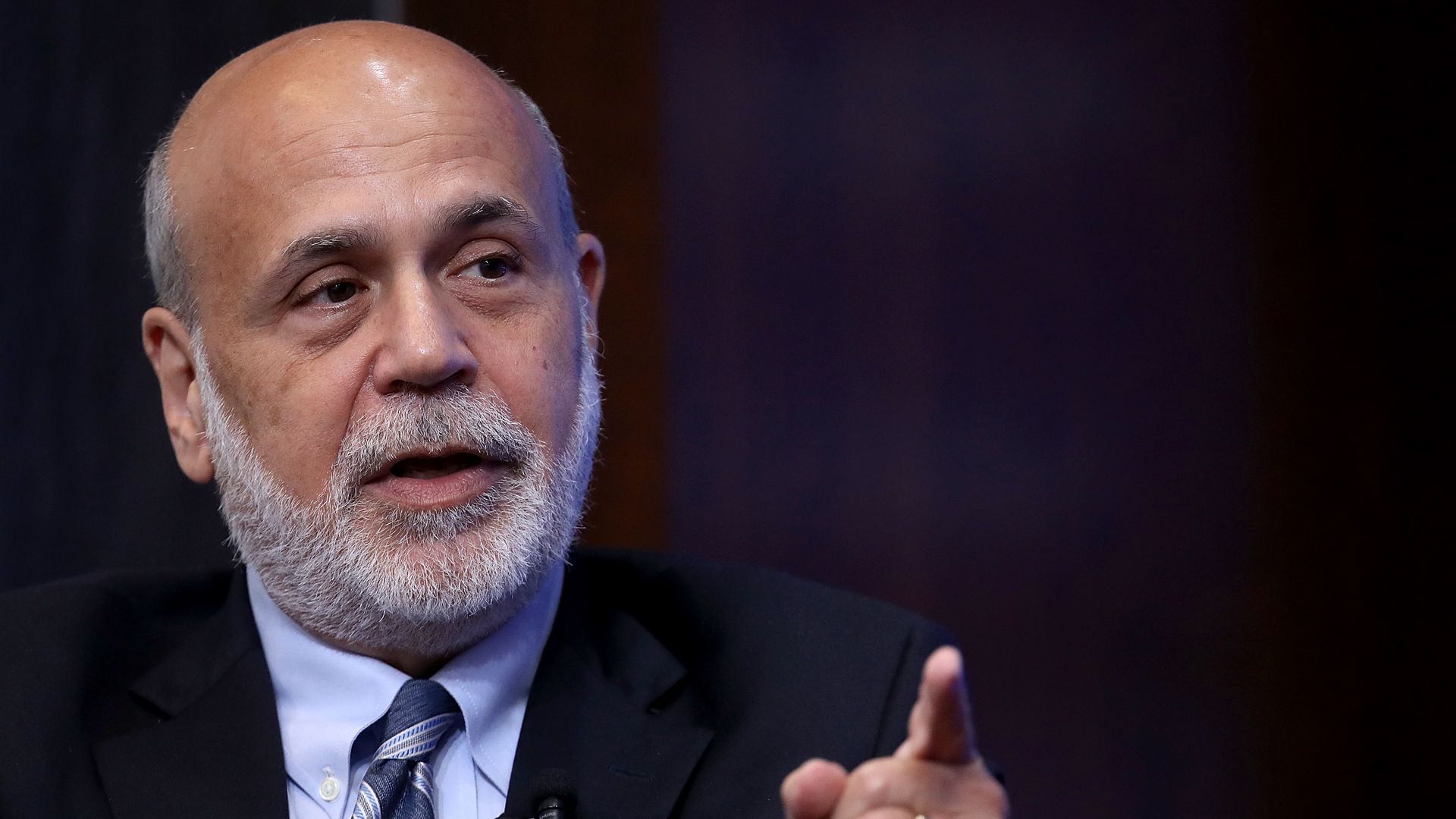 Former Federal Reserve Board Chairman Ben Bernanke answers questions at a conference with former at the Brookings Institution September 12, 2018 in Washington, DC. 