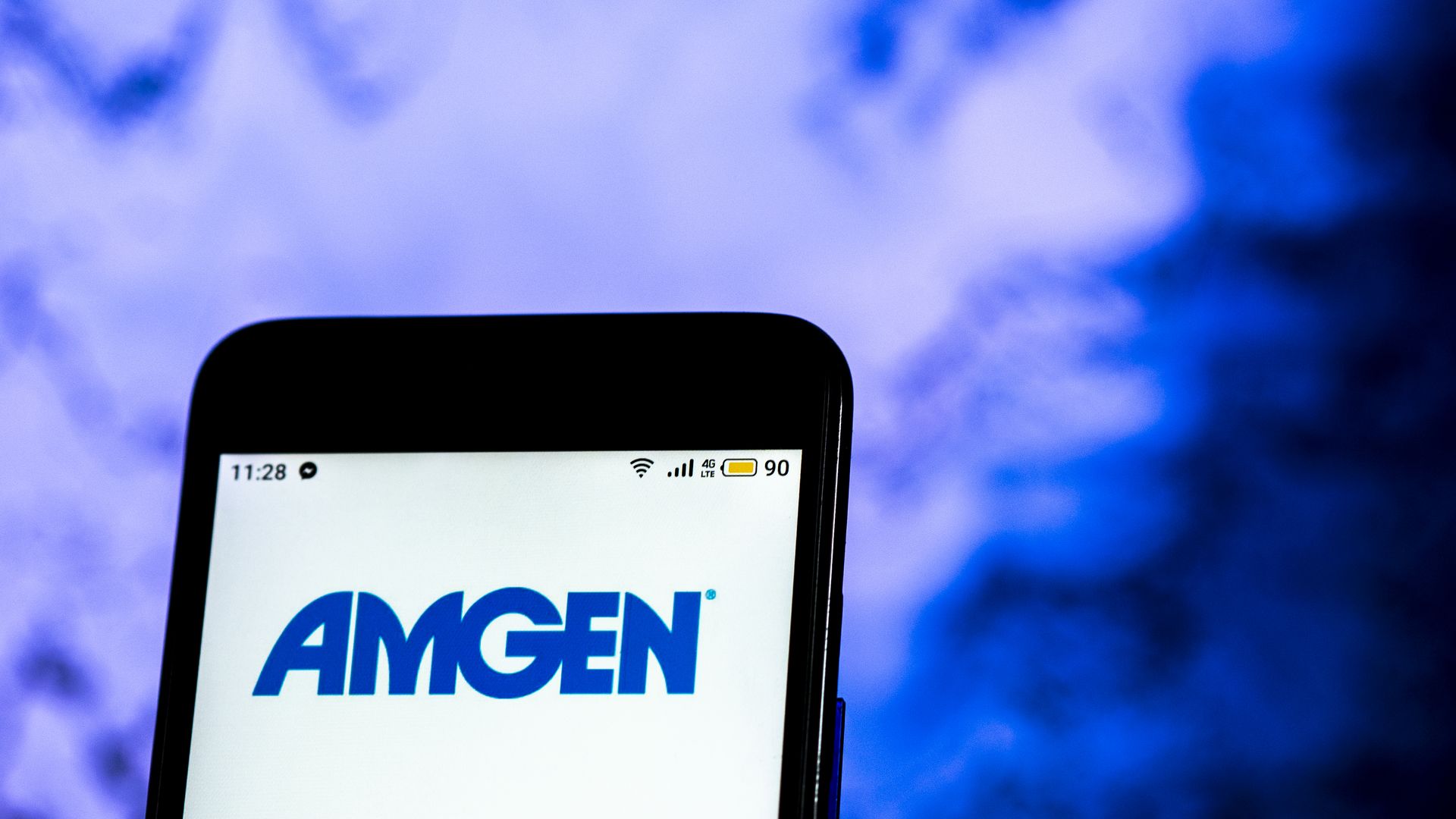 Amgen logo on a phone screen