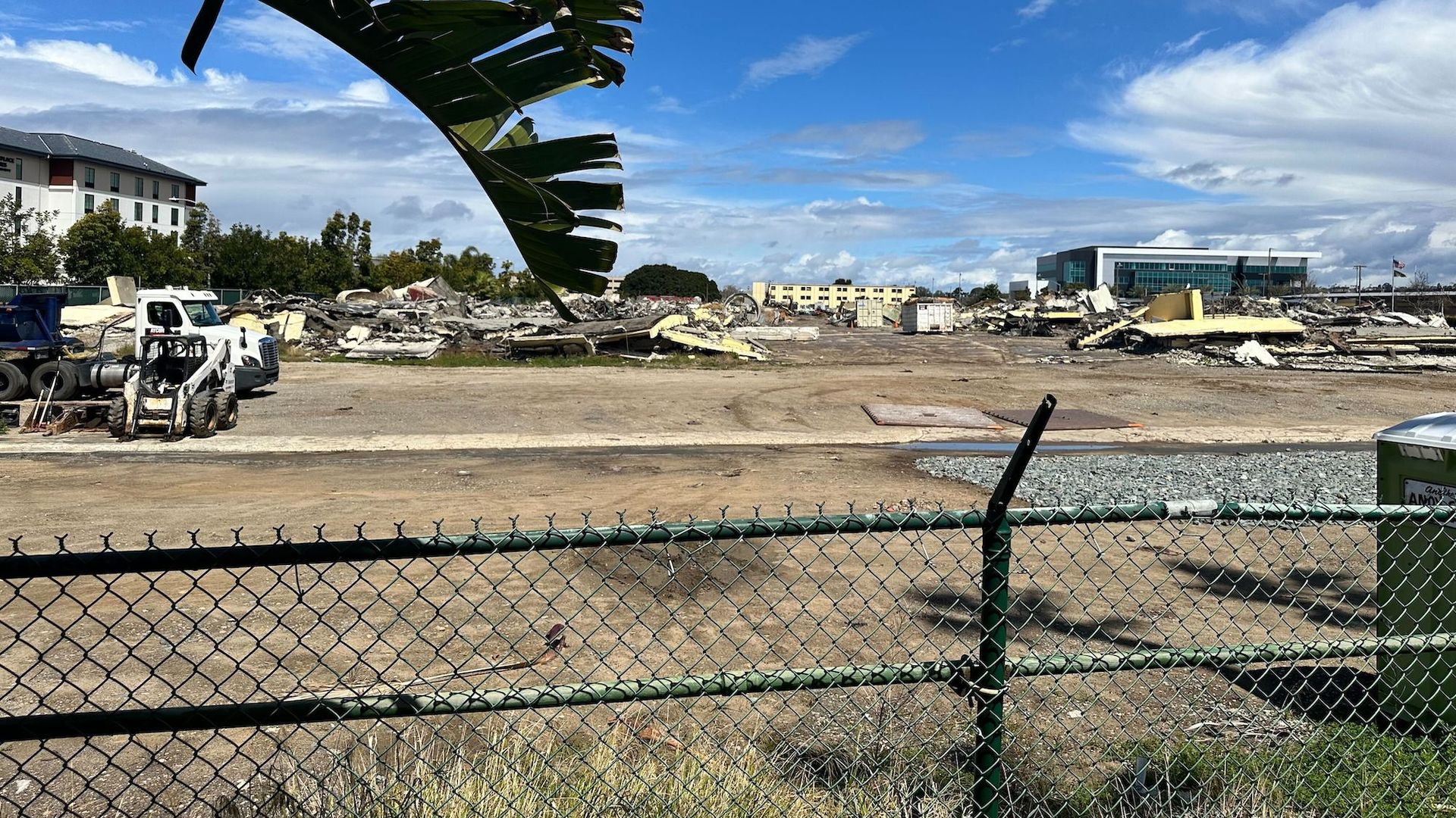 An empty lot with debris. 
