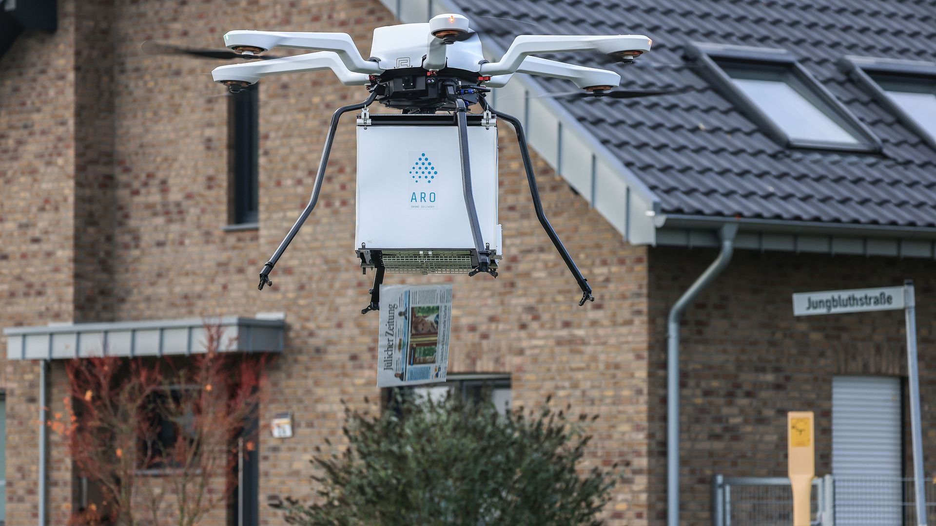 A newspaper drops from a drone in Germany.