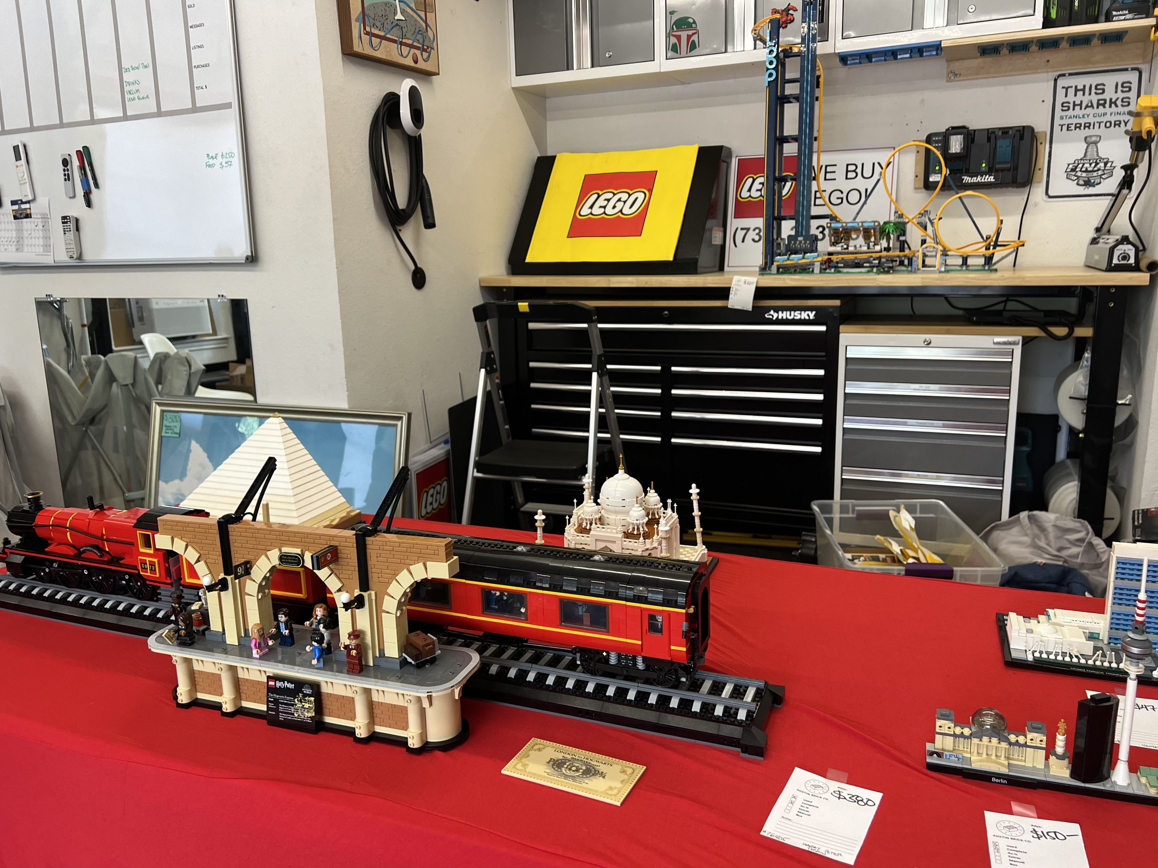 A photo of a Lego Harry Potter set on a red table cloth.